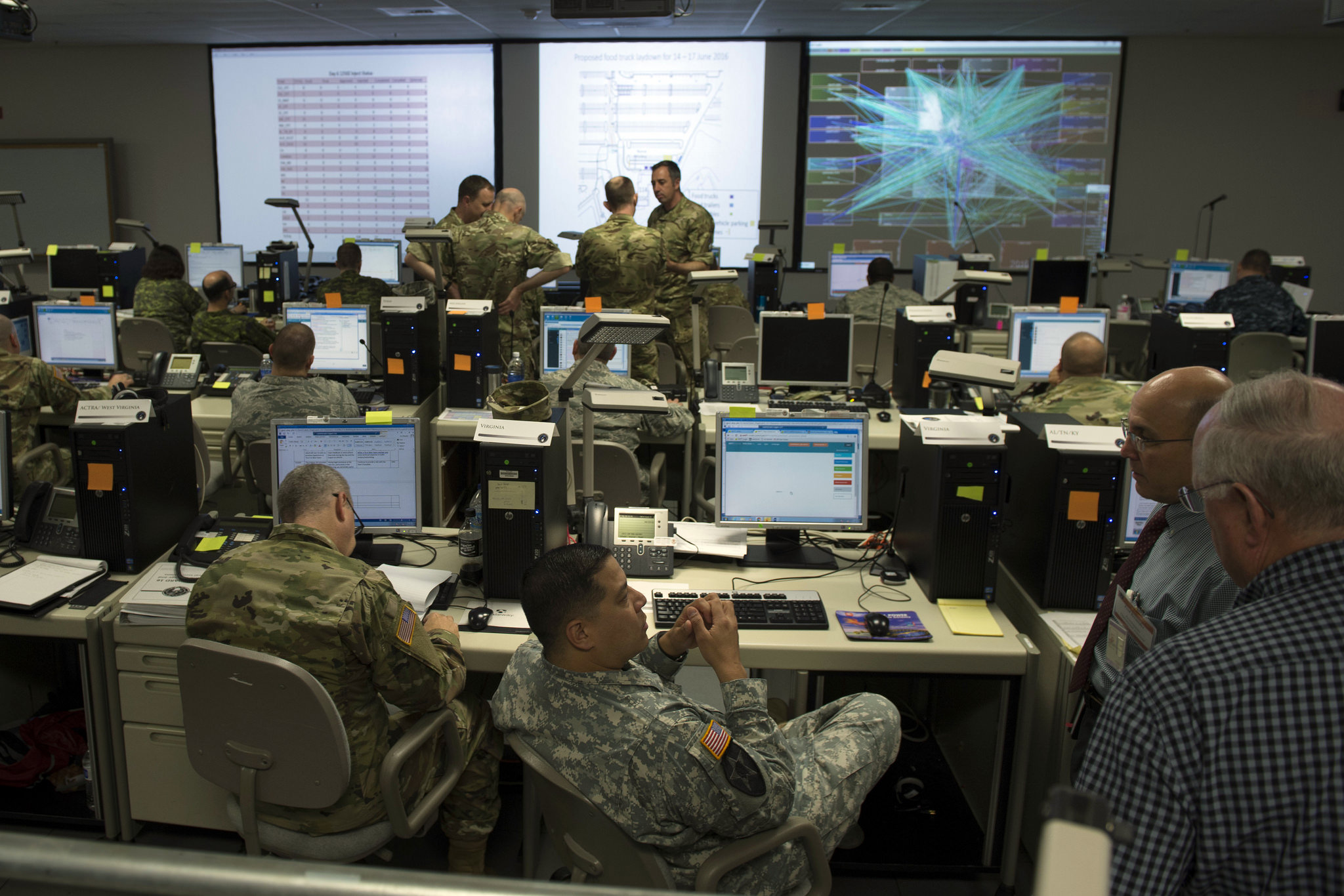 Participants in the joint, multinational exercise Cyber Guard 2016 work through a training scenario during the nine-day event in Suffolk, Va., June 16, 2016. Navy photo by Petty Officer 2nd Class Jesse A. Hyatt. -