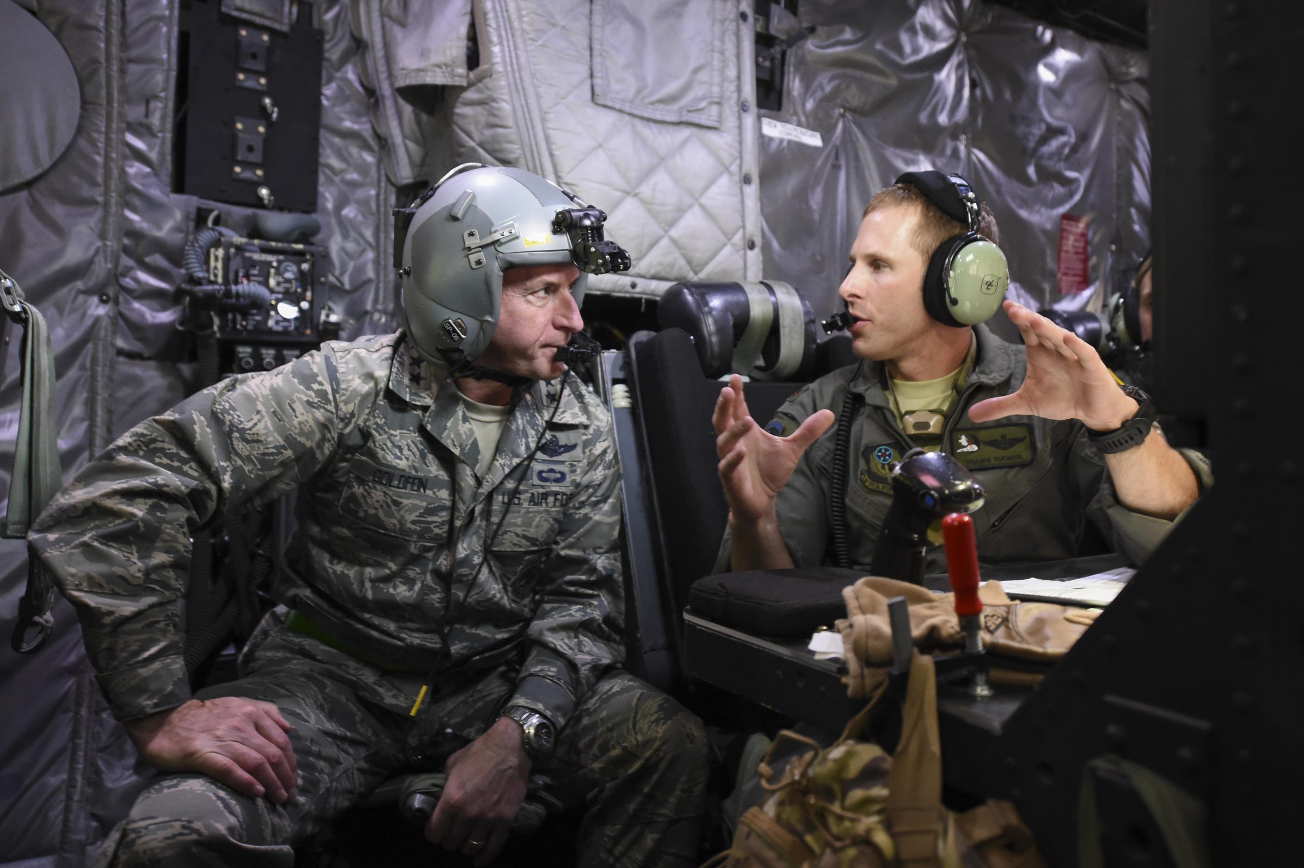 Air Force Maj. Travis Tucker, fire control officer with the 4th Special Operations Squadron, right, explains an AC-130U Spooky gunship’s weapons systems to Air Force Chief of Staff Gen. David L. Goldfein during a mission orientation flight at Hurlburt Field, Fla., Oct. 19, 2016. Air Force photo by Senior Airman Jeff Parkinson. -