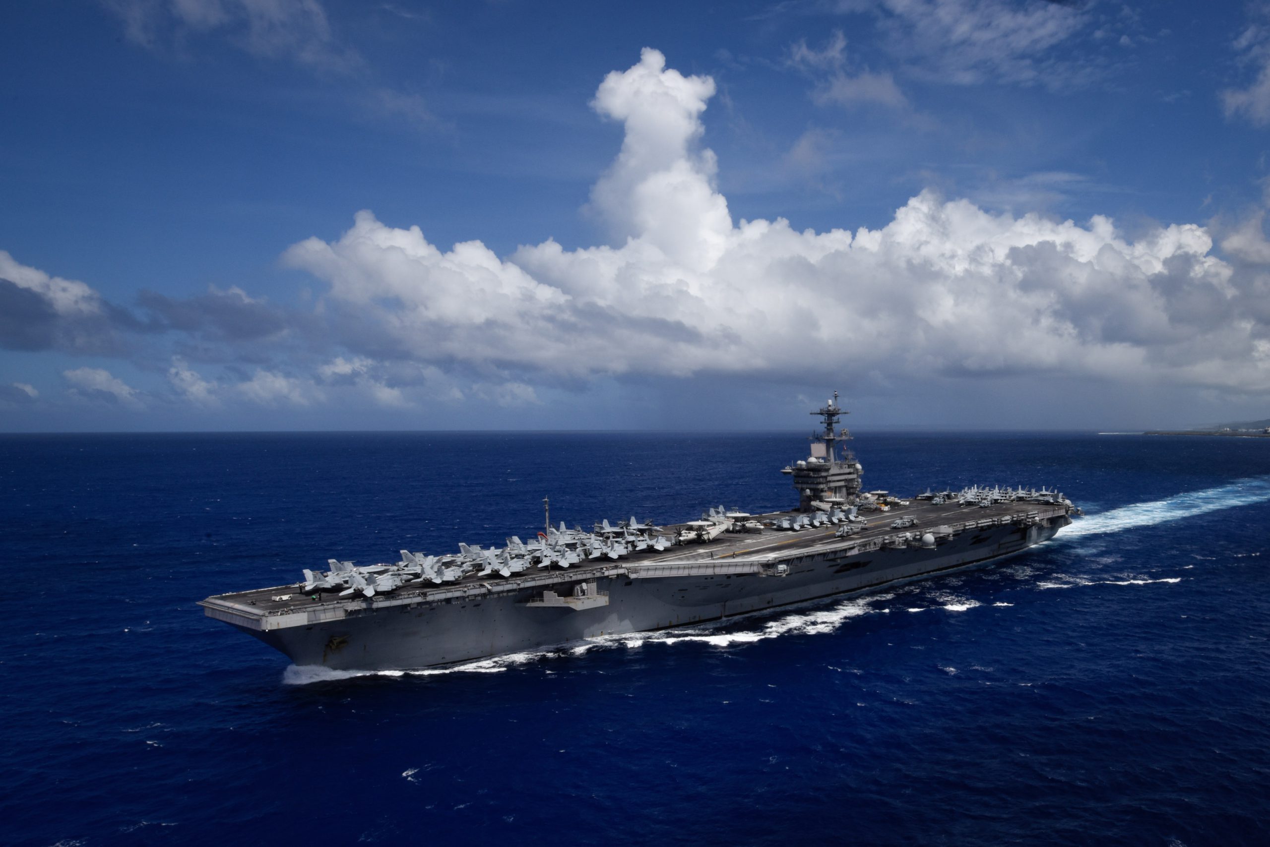 PACIFIC OCEAN (Nov. 4, 2017) The aircraft carrier USS Theodore Roosevelt (CVN 71) transits the Pacific Ocean. Theodore Roosevelt is deployed in the U.S. 7th Fleet area of operations in support of maritime security operations and theater security cooperation efforts. U.S. Navy photo by Mass Communication Specialist 3rd Class Anthony J. Rivera. -
