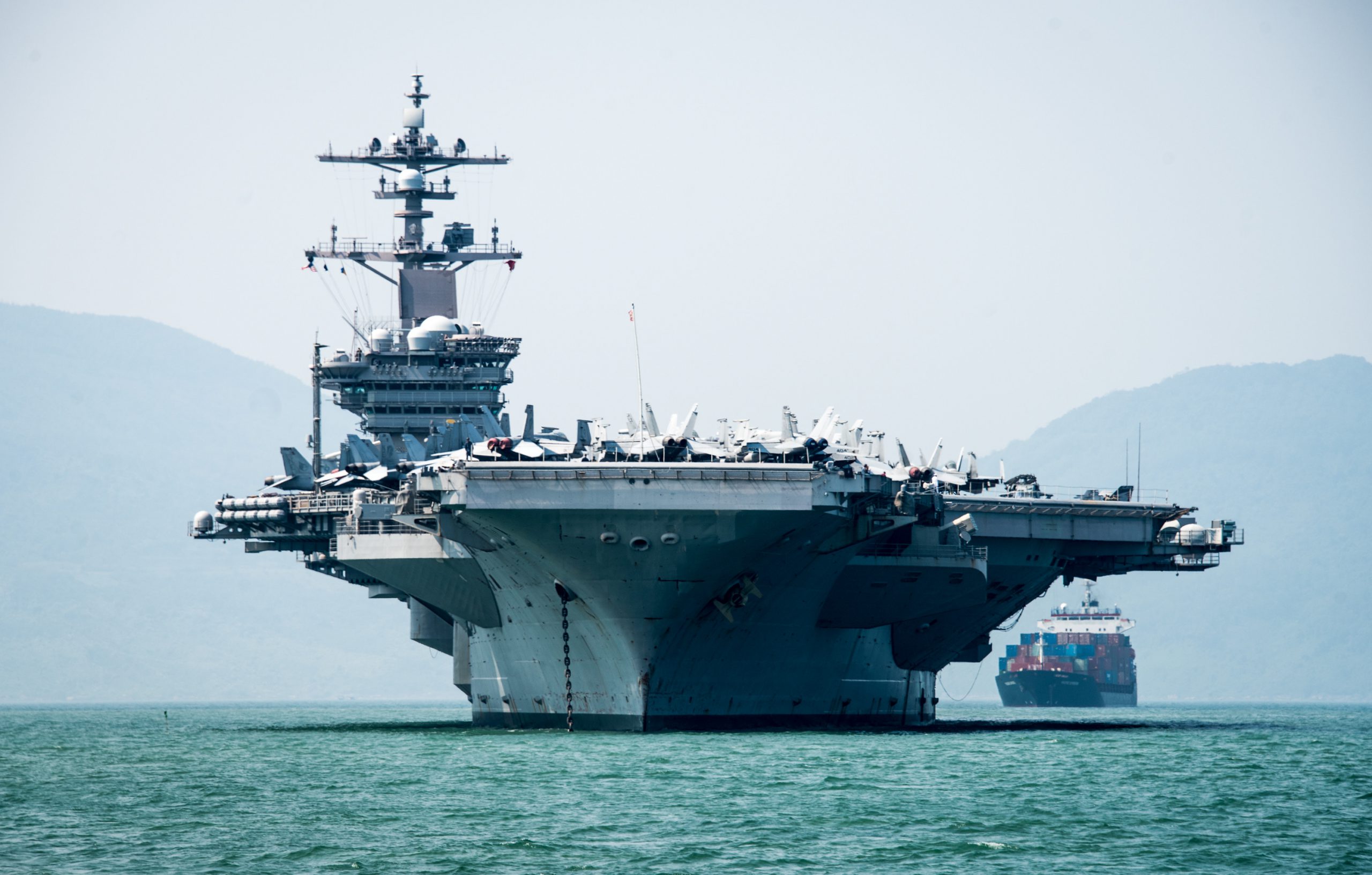The aircraft carrier USS Carl Vinson arrives in Danang, Vietnam, for a scheduled port visit -