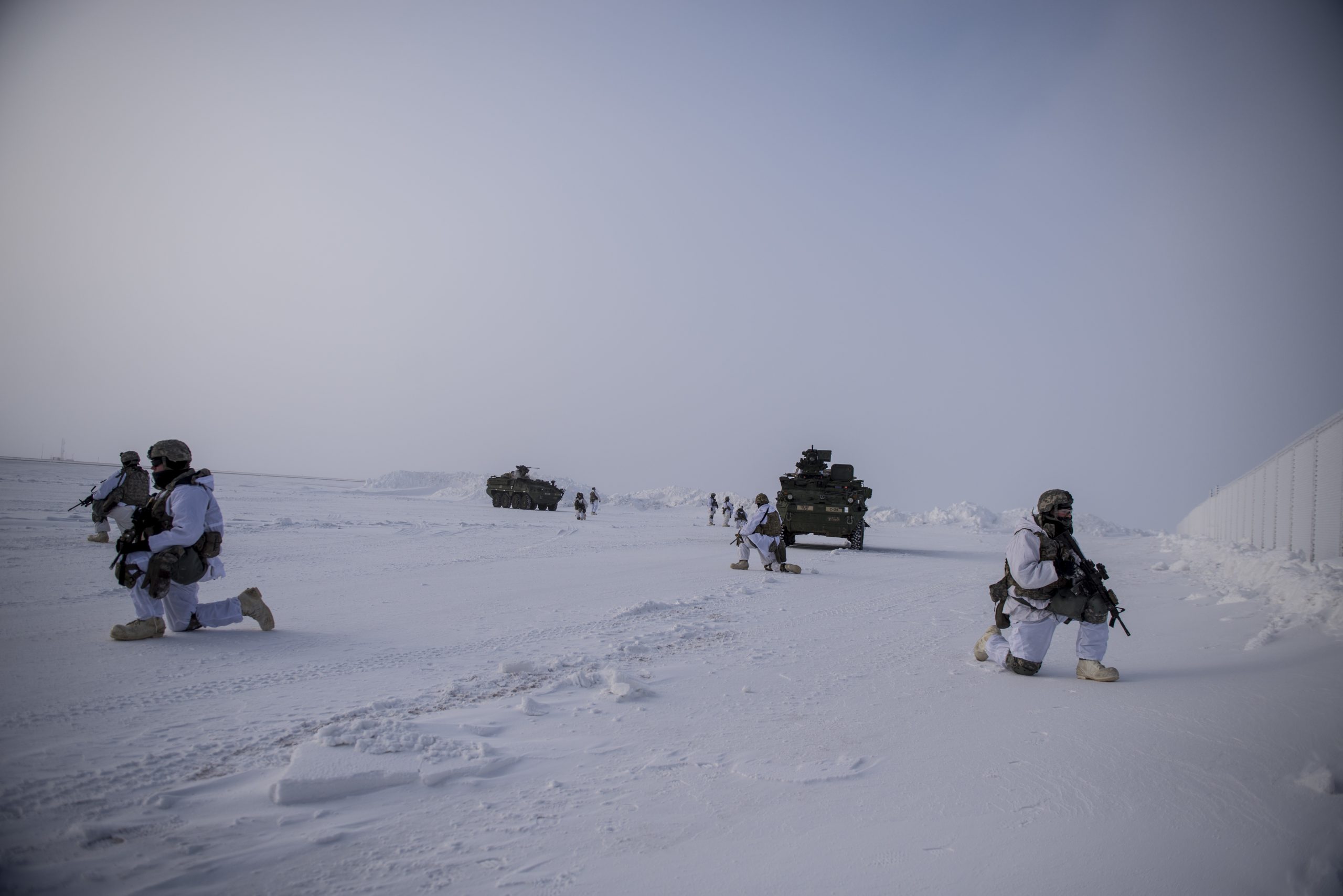 Soldiers assigned to 3rd Battalion, 21st Infantry Regiment provide overwatch during a deployment of Stryker armored vehicles as part of the U.S. Army Alaska-led Arctic Edge 2018 exercise held at Eielson Air Force Base, Alaska, March 13, 2018. Arctic Edge 2018 is a biennial, large-scale, joint-training exercise that prepares and tests the U.S. military’s ability to operate tactically in extreme cold-weather conditions found in arctic environments Air Force photo by Airman 1st Class Isaac Johnson. -