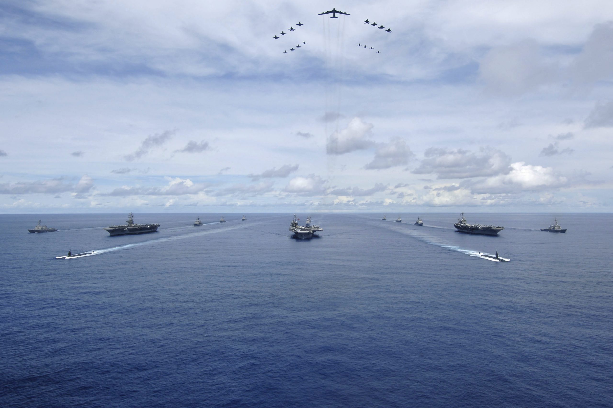 PACIFIC OCEAN (Aug.14, 2007) - USS Nimitz (CVN 68), USS Kitty Hawk (CV 63) and USS John C. Stennis (CVN 74) Carrier Strike Groups transit in formation during a joint photo exercise (PHOTOEX) during exercise Valiant Shield 2007. The aerial formation consists of aircraft from the carrier strike groups as well as Air Force aircraft. The strike groups are participating in Valiant Shield 2007, the largest joint exercise in the Pacific this year. Held in the Guam operating area, the exercise includes 30 ships, more than 280 aircraft and more than 20,000 service members from the Navy, Air Force, Marine Corps, and Coast Guard. U.S. Navy photo by Mass Communication Specialist Seaman Stephen W. Rowe. -