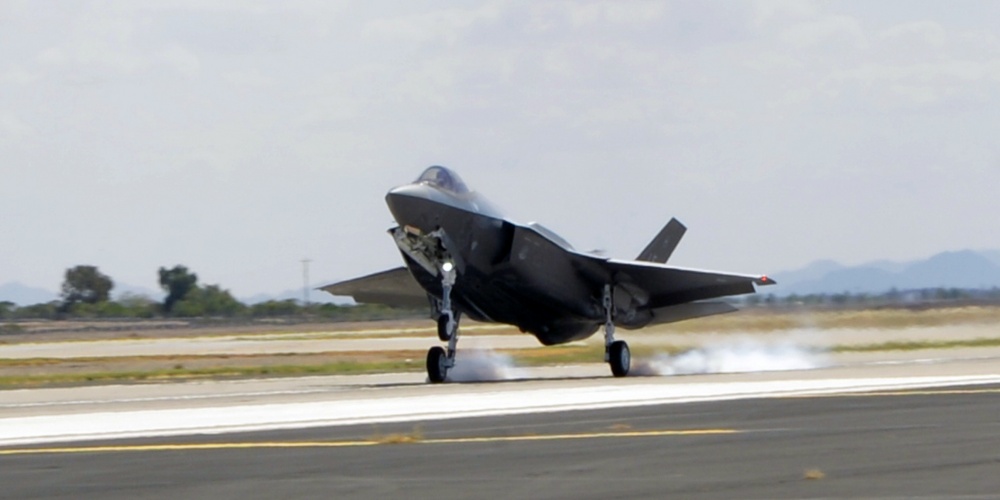 The Air Force’s 100th F-35 Lightning II lands at Luke Air Force Base, Ariz., Aug. 26, 2016. The aircraft, designated AF-100, marked a milestone for the F-35 program. Air Force photo by Staff Sgt. Marcy Copeland. -