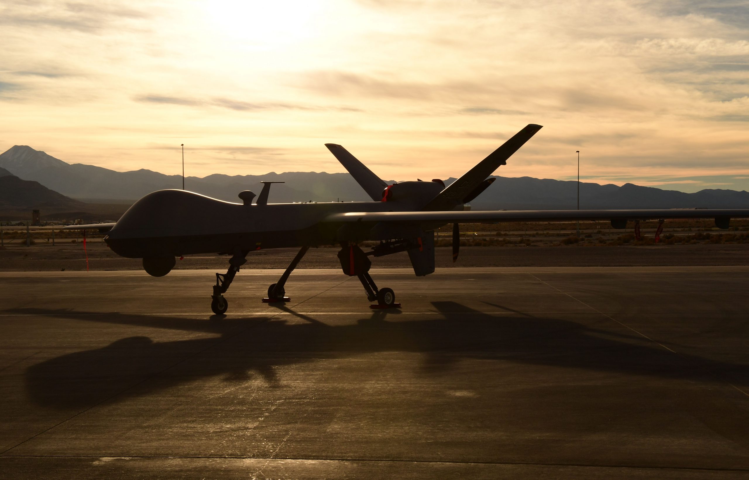 An Air Force MQ-9 Reaper unmanned aircraft awaits maintenance at Creech Air Force Base, Nev., Dec. 8, 2016. The Air Force is set to retire the MQ-1 Predator and transition solely to the more capable MQ-9 in early 2018. Air Force photo by Senior Airman Christian Clausen. -