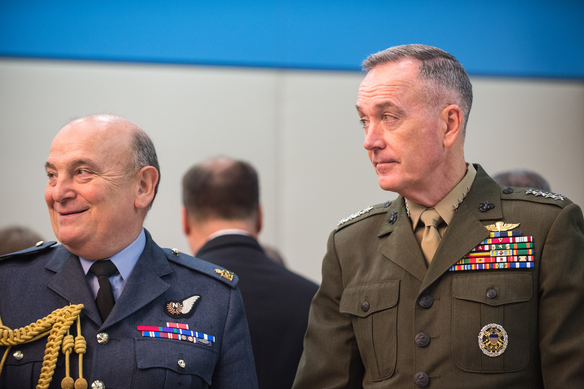 Marine Corps Gen. Joe Dunford, chairman of the Joint Chiefs of Staff, speaks with Air Chief Marshal Sir Stuart Peach, the United Kingdom’s chief of defense, before a meeting of the NATO Military Committee alliance at the alliance’s headquarters in Brussels, Jan. 17, 2017. DoD photo by Army Sgt. James K. McCann. -