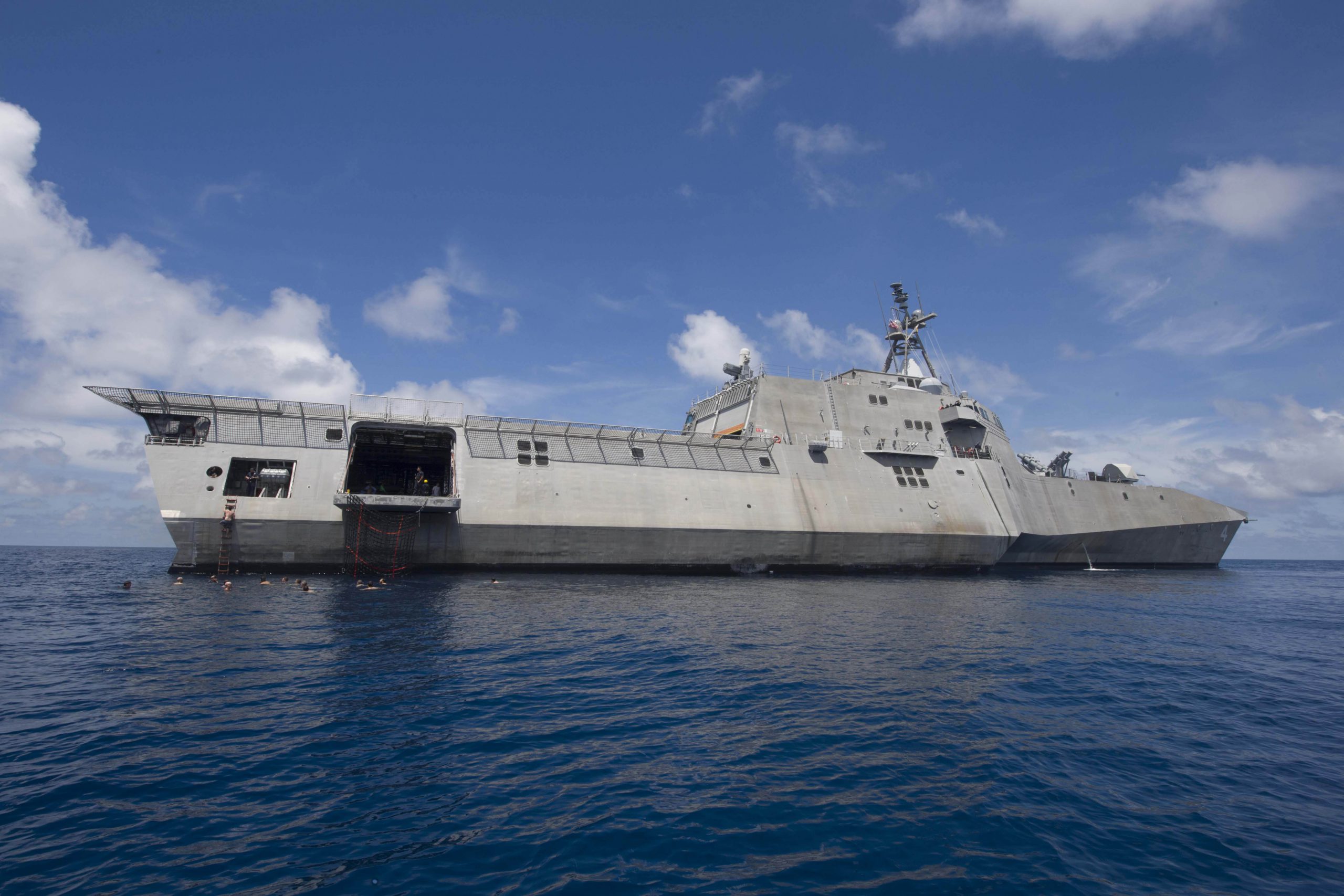 Sailors assigned to the littoral combat ship USS Coronado swim in the South China Sea, Feb. 23, 2017. Coronado is a fast and agile warship tailor-made to patrol the region's littorals and work with partner navies, providing the U.S. 7th Fleet with the flexible capabilities it needs now and into the future. Navy photo by Petty Officer 2nd Class Amy M. Ressler. -