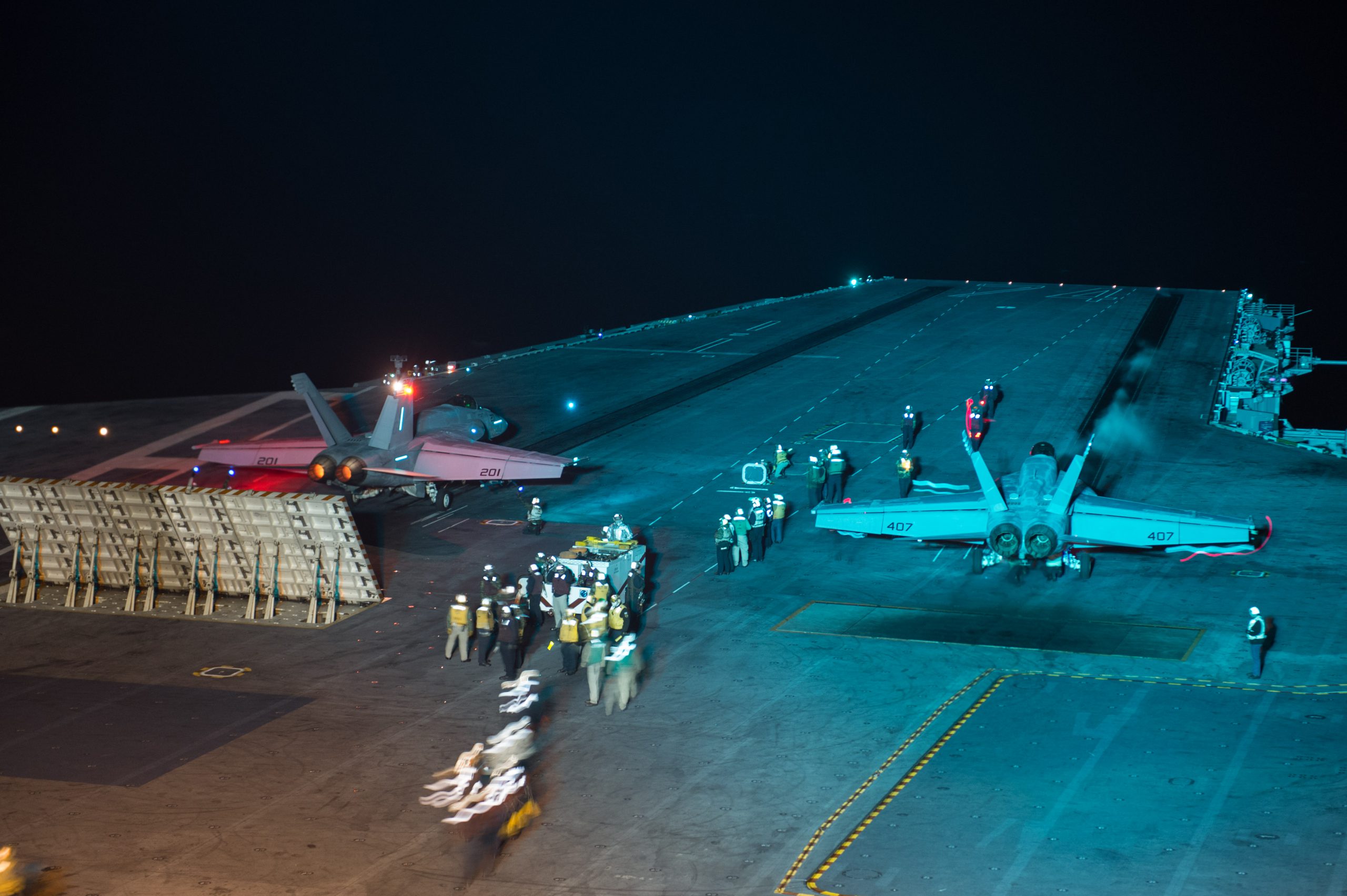 PACIFIC OCEAN, (April 16, 2018) F/A-18E Super Hornets prepare to launch during night flight operations aboard the aircraft carrier USS John C. Stennis (CVN 74). John C. Stennis is underway with Carrier Air Wing 9 conducting routine training as well as tailored ships training availability and final evaluation problem. (U.S. Navy photo by Mass Communication Specialist 3rd Class Joseph L. Miller. -