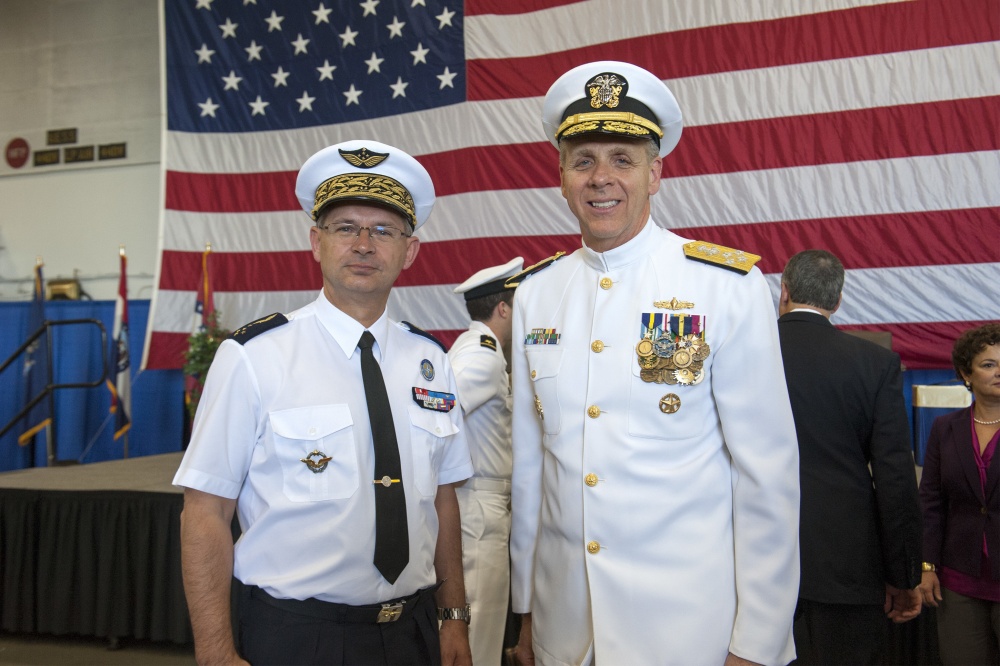 French Air Force Gen. Denis Mercier, Supreme Allied Commander Transformation, poses with Adm. Phil Davidson following a change of command ceremony aboard the aircraft carrier USS George H.W. Bush (CVN 77). Allied Command Transformation (ACT) is the North Atlantic Treaty Organization's (NATO) home in North America and continues to serve as the transatlantic bond since its inception in 2003. The city of Norfolk, and the region as a whole, serves as the host to both military and civilian personnel from 34 allied and partner nations who are assigned to ACT. Official U.S. Navy Photo by Lt. Cmdr. Dawn Stankus. -
