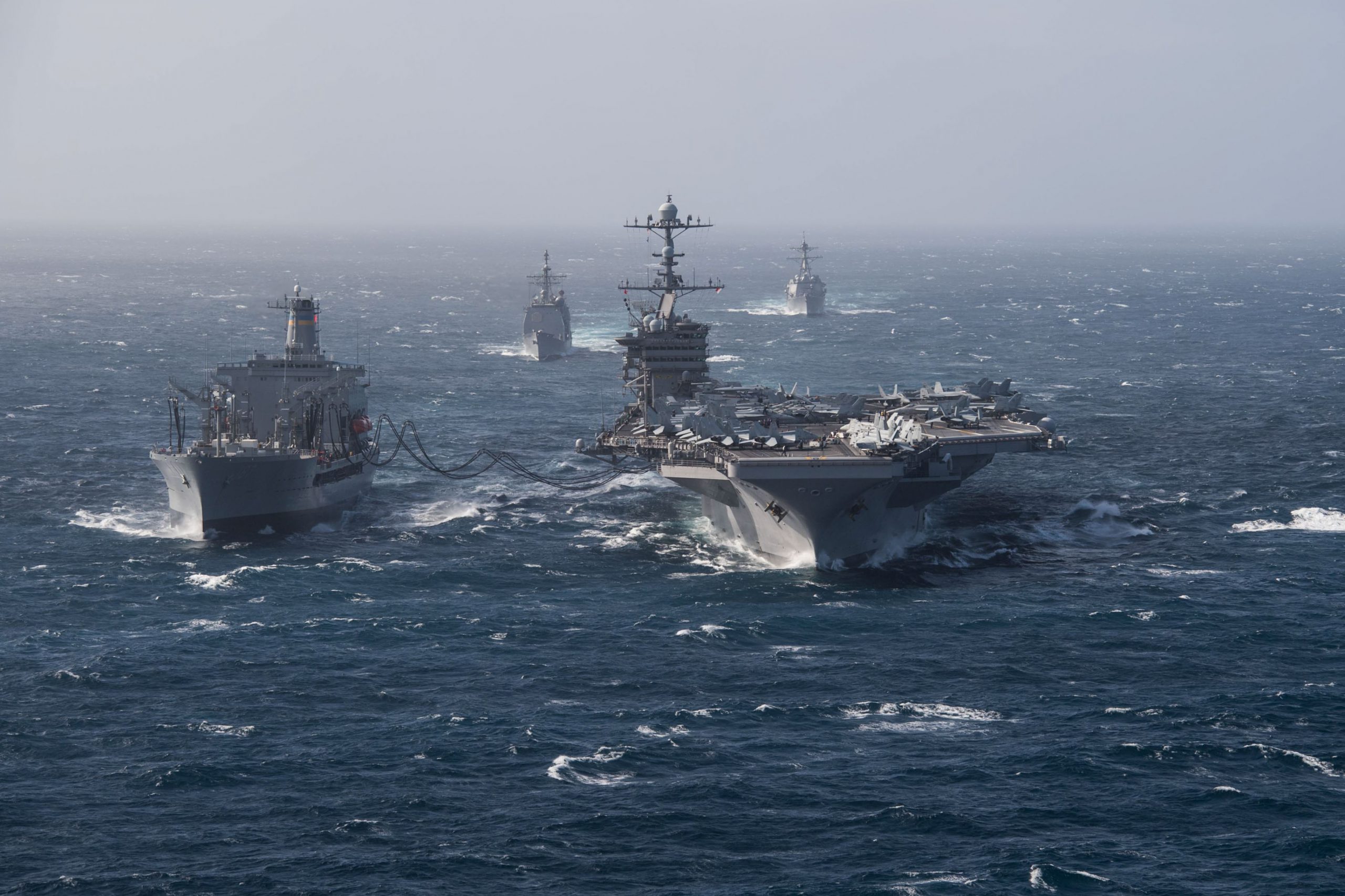 PACIFIC OCEAN (May 10, 2018) The aircraft carrier USS John C. Stennis (CVN 74), right, conducts a replenishment-at-sea with the fleet replenishment oiler USNS Henry J. Kaiser (T-AO 187). John C. Stennis is underway with the ships and squadrons of Carrier Strike Group (CSG) 3 conducting a group sail training in preparation for its next scheduled deployment. U.S. Navy photo by Mass Communication Specialist 2nd Class David A. Brandenburg. -