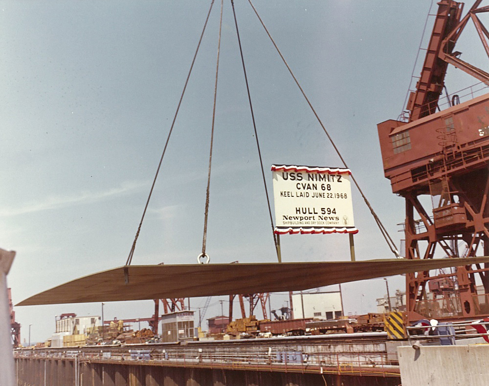 A U.S. Navy file photo of the keel of the aircraft carrier USS Nimitz (CVN 68) as it is lowered into the shipyard dock at Newport News Shipbuilding in Newport News, Va., June 22, 1968 -- U.S. Navy photo provided by USS Nimitz photo archives. -