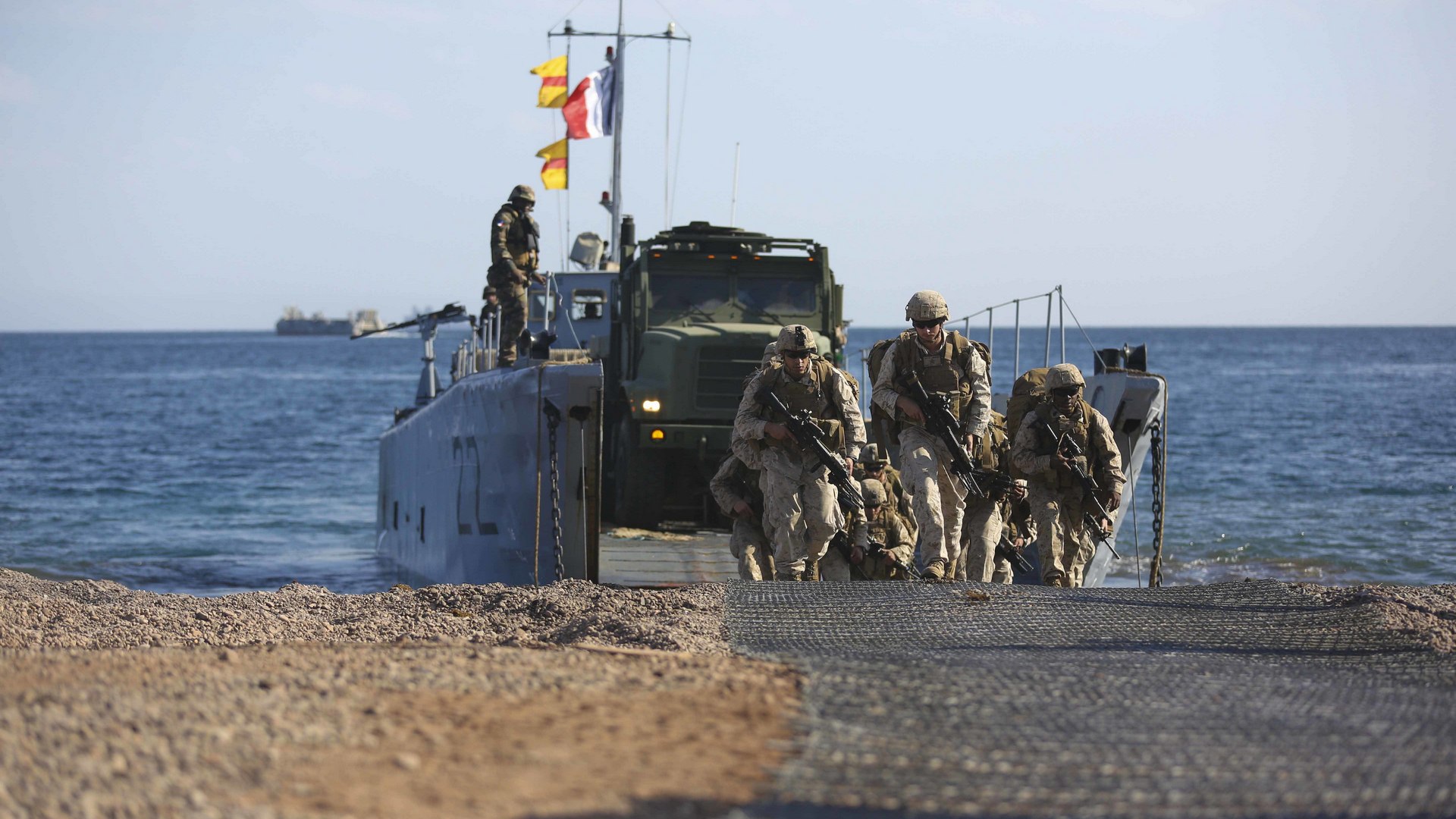 U.S. Marines and French military forces disembark a French roll-on/roll-off catamaran landing craft during Alligator Dagger -- Photo © Staff Sgt. Vitaliy Rusavskiy. -