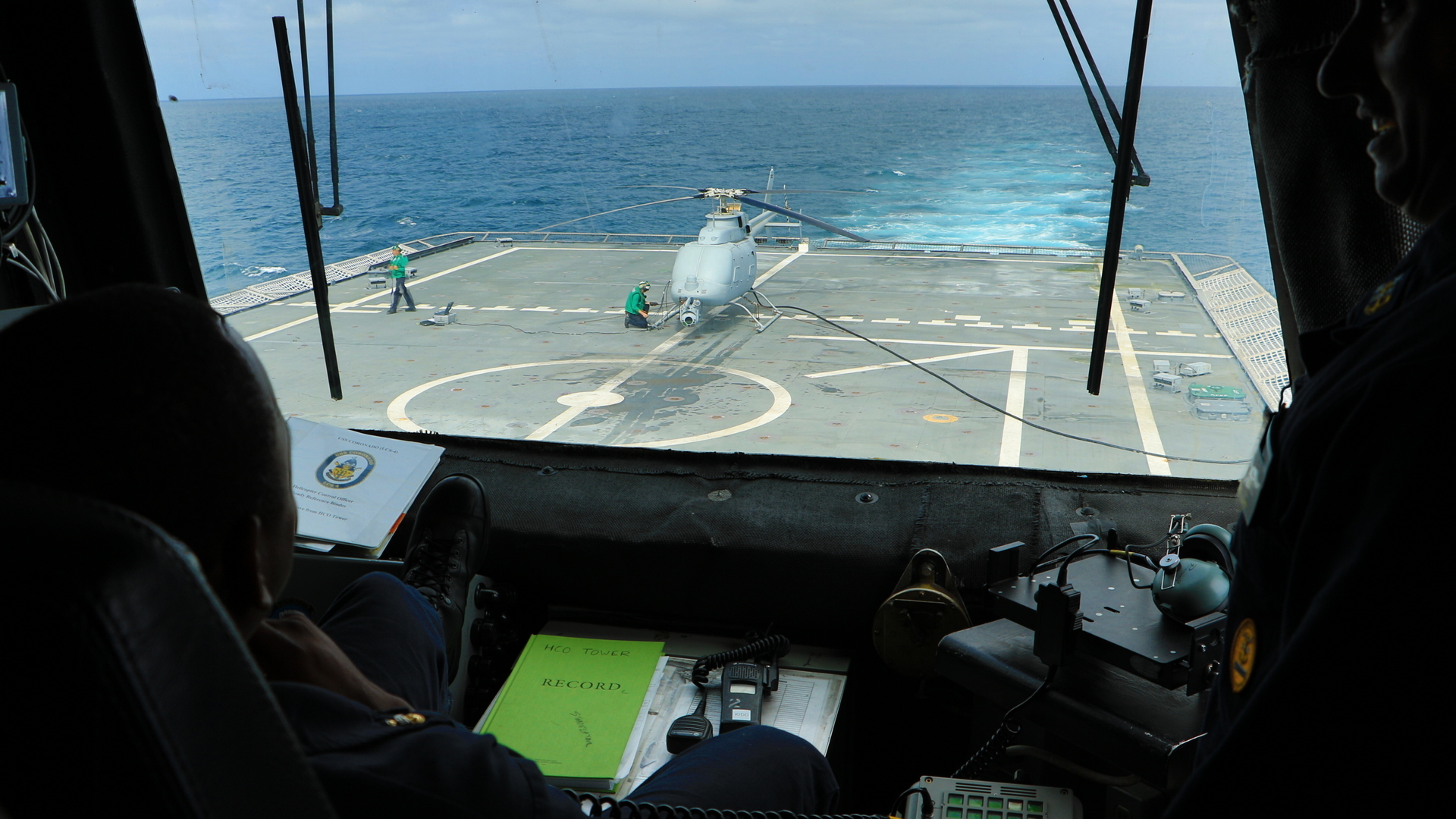 Pacific Ocean (June 21, 2018) Sailors assigned to the littoral combat ship USS Coronado (LCS 4) monitor flight operations from the helicopter control tower as an MQ-8C Fire Scout unmanned helicopter prepares to launch. (U.S. Navy photo by Ensign Jalen Robinson. -