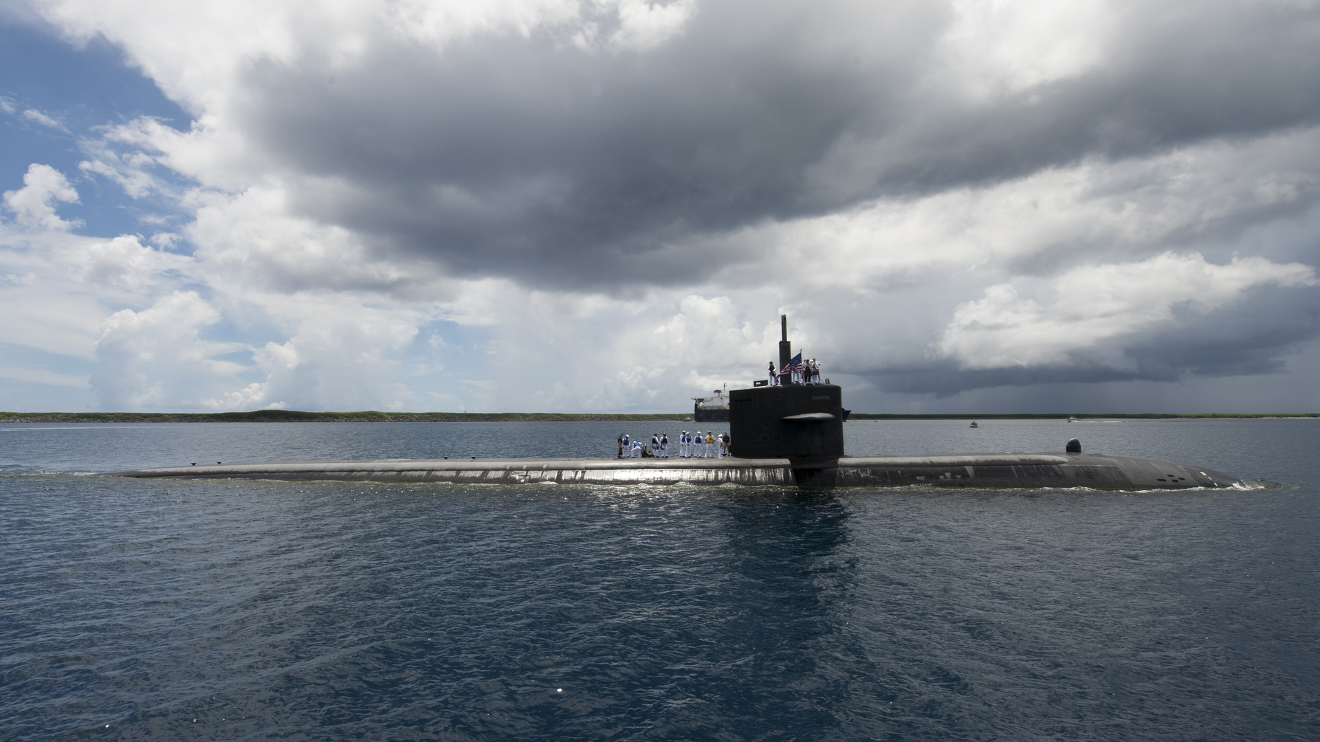 Apra Harbor, Guam: (June 29, 2018) The Los Angeles-class fast-attack submarine USS Oklahoma City (SSN 723) returns to its homeport of Apra Harbor, Guam. Oklahoma City is one of four forward-deployed submarines assigned to Submarine Squadron 15 -- U.S. Navy photo by Culinary Specialist Seaman Jonathan Perez. -
