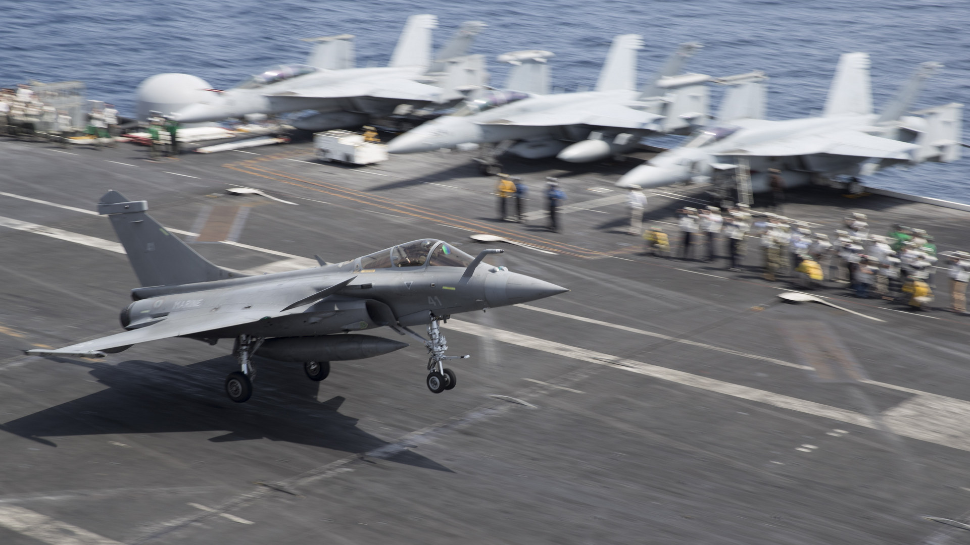 Atlantic Ocean (July 3, 2018) A French Dasault Rafale M Fighter prepares to land on the flight deck of the Nimitz-class aircraft carrier USS Harry S. Truman (CVN 75). Harry S. Truman is deployed as part of an ongoing rotation of U.S. forces supporting maritime security operations in international waters around the globe -- U.S. Navy photo by Mass Communication Specialist 3rd Class Gitte Schirrmacher. -