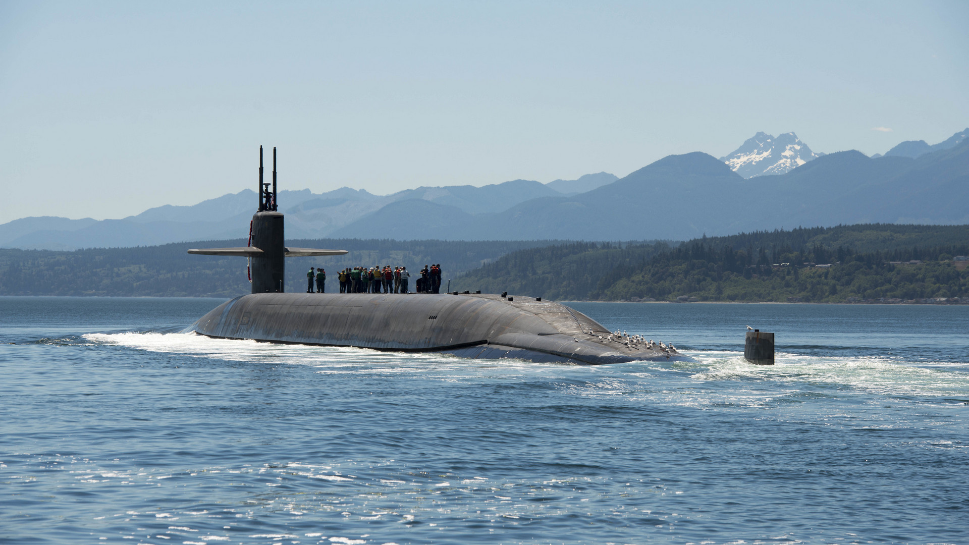 Puget Sound, Wash. (July 12, 2018) The Ohio-class ballistic missile submarine USS Nebraska (SSBN 739) transits the Hood Canal as it returns home to Naval Base Kitsap-Bangor following the boat's first strategic patrol since 2013. Nebraska recently completed a 41-month engineered refueling overhaul, which will extend the life of the submarine for another 20 years. (U.S. Navy photo by Mass Communication Specialist 1st Class Amanda R. Gray. -
