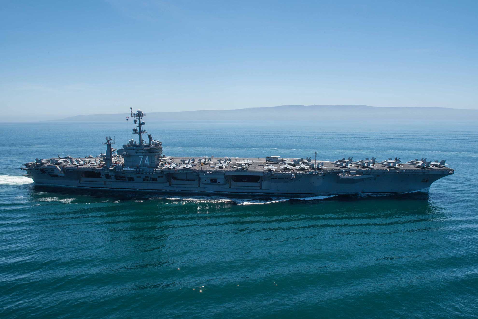 Pacific Ocean -- (May 7, 2018) USS John C. Stennis maneuvers during a formation sailing evolution. Carrier Strike Group (CSG) 3 is underway conducting group sail training in preparation for its next scheduled deployment -- U.S. Navy photo by MCS3 Jake Greenberg. -