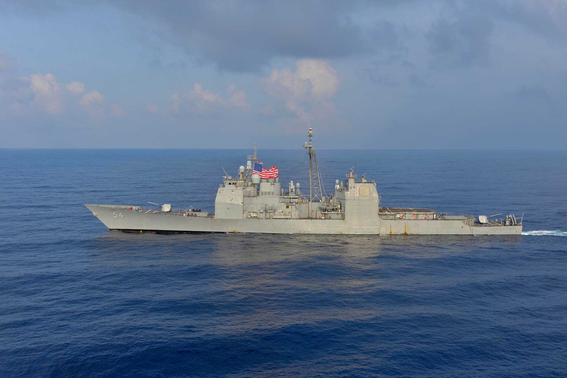 South China Sea (Aug. 31, 2018) The guided-missile cruiser USS Antietam (CG 54) is underway alongside the Navy's forward aircraft carrier USS Ronald Reagan (CVN 76) during a photo exercise with the Japan Maritime Self-Defense Force. The Ronald Reagan Carrier Strike Group is forward-deployed to the U.S. 7th Fleet area of operations in support of security and stability in the Indo-Pacific region -- U.S. Navy photo by MCS1Timothy M. Black. -
