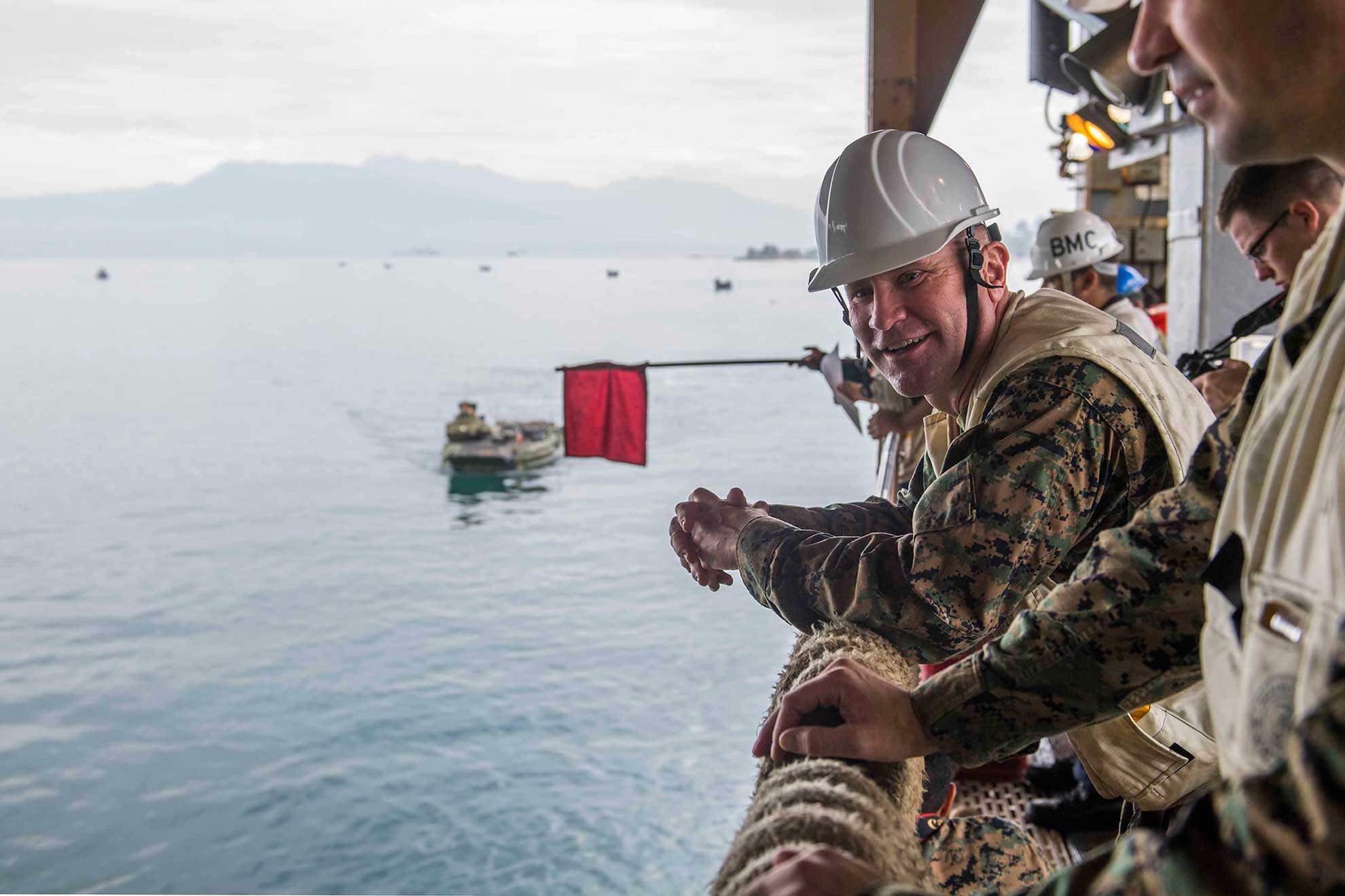 Subic Bay Republic of the Philippines (Oct. 3, 2018) Brig. Gen. Chris A. McPhillips, commanding general of the 3rd Marine Expeditionary Brigade, observes Marines attached to the 31st Marine Expeditionary Unit (MEU) and the Japan Ground Self-Defense Force (JGSDF) Amphibious Rapid Deployment Brigade (ARDB) conduct assault amphibious vehicle operations with the amphibious dock landing ship USS Ashland (LSD 48) as part of a training exercise for KAMANDAG 2 -- U.S. Navy photo by MCS2 Joshua Mortensen. -
