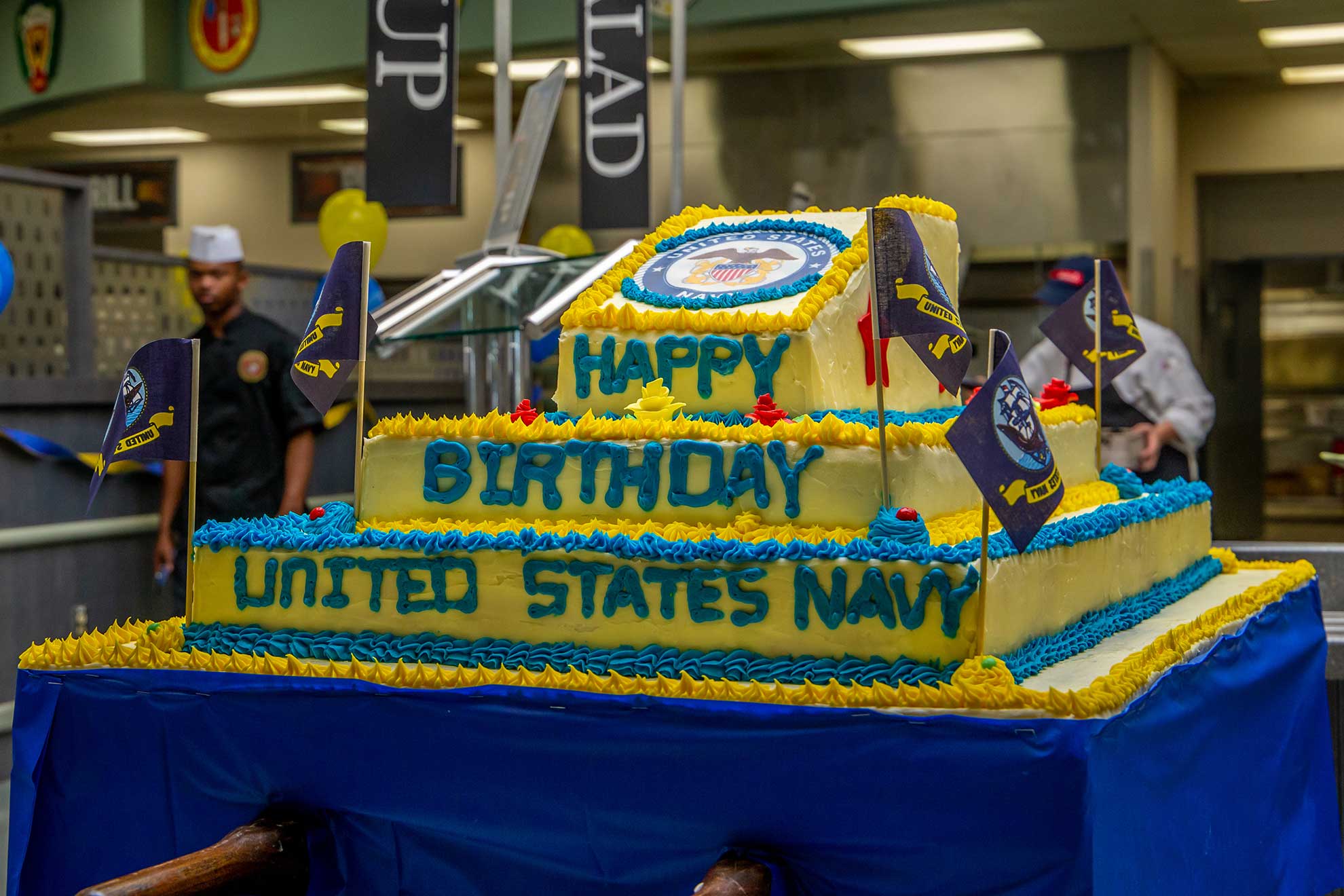 Washington D.C. (Oct. 12, 2018) Chief of Naval Operations Adm. John Richardson, right, is joined by the most junior and senior Sailors attending for a cake cutting during the 243rd Navy birthday celebration at the Pentagon -- U.S. Navy photo by MCS1 Raymond D. Diaz III. -
