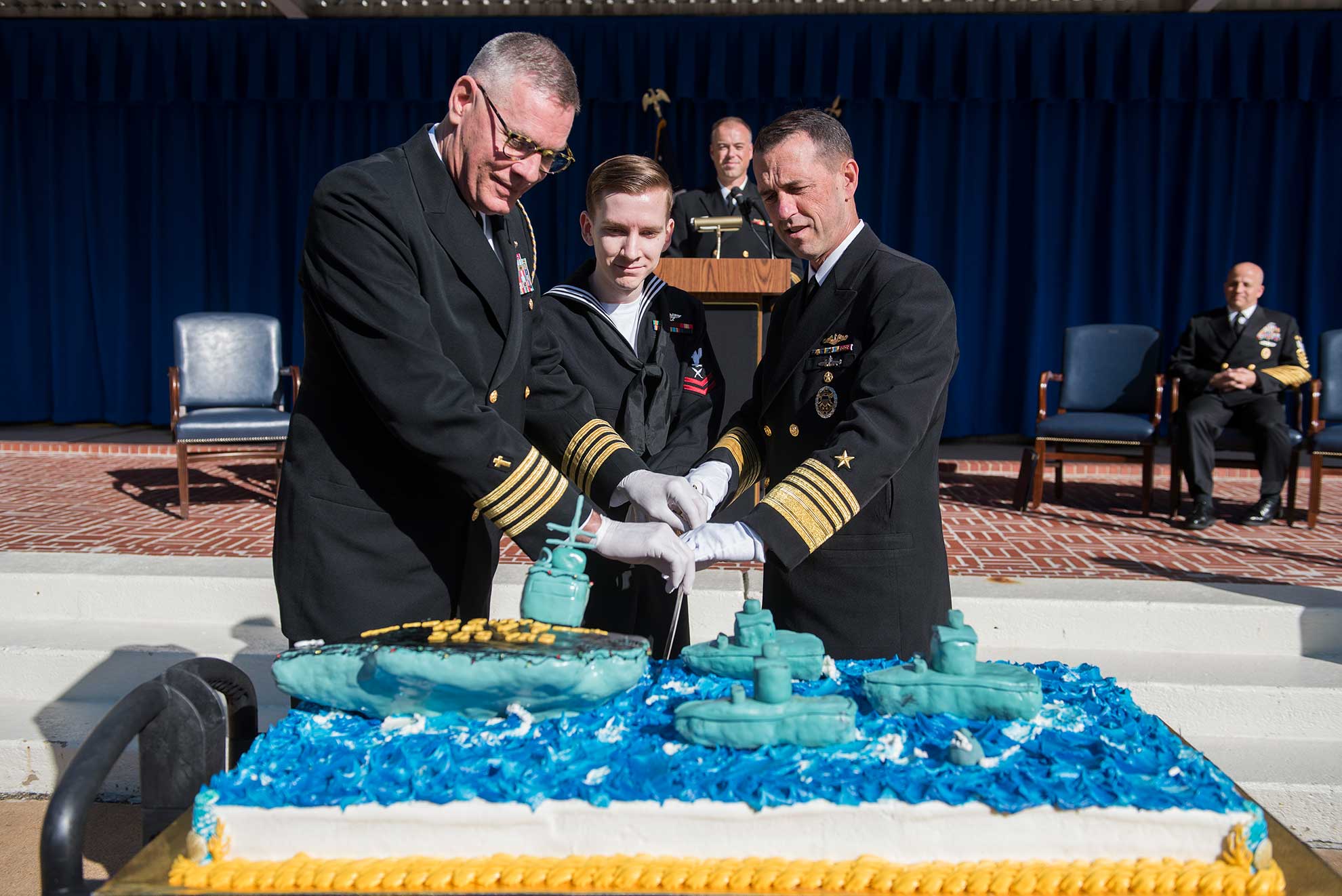 Washington D.C. (Oct. 12, 2018) Chief of Naval Operations Adm. John Richardson, right, is joined by the most junior and senior Sailors attending for a cake cutting during the 243rd Navy birthday celebration at the Pentagon -- U.S. Navy photo by MCS1 Raymond D. Diaz III. -