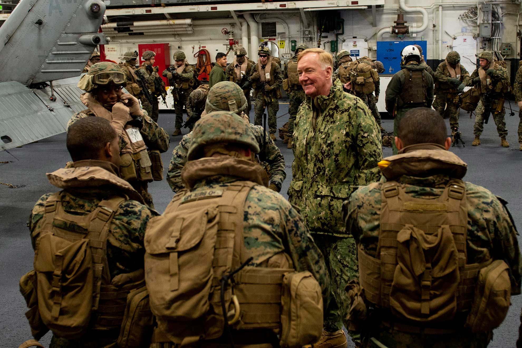 Atlantic Ocean (Oct. 17, 2018) Adm. James G. Foggo III, commander of U.S. Naval Forces Europe-Africa and Allied Joint Force Command Naples, speaks to Marines in the hangar bay aboard the Wasp-class amphibious assault ship USS Iwo Jima (LHD 7), Oct. 17, 2018. Iwo Jima is underway prior to participating in Trident Juncture 2018 which is a NATO-led exercise designed to certify NATO response forces and develop interoperability among participating NATO and partner nations -- U.S. Navy photo by MCS3 Joe J. Cardona Gonzalez. -
