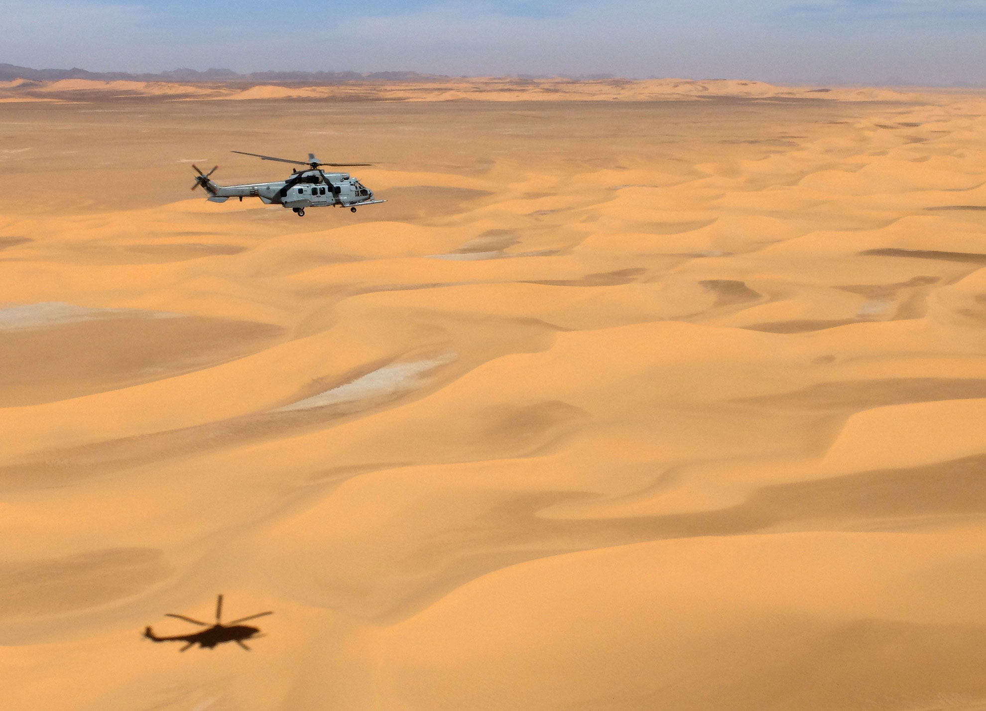 French HM-225 Caracal flying over the desert -- French Air Force © photo. -