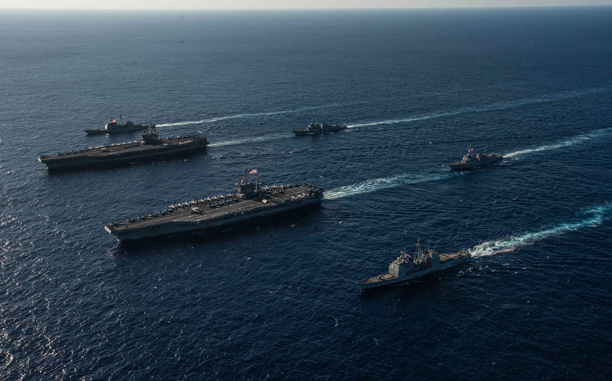 Philippine Sea (Nov. 16, 2018) Ships attached to the Ronald Reagan Carrier Strike Group and John C. Stennis Carrier Strike Group transit the Philippine Sea during dual carrier operations. Ronald Reagan and John C. Stennis are underway and conducting operations in international waters as part of a dual carrier strike force exercise. The U.S. Navy has patrolled the Indo-Pacific region routinely for more than 70 years promoting regional security, stability and prosperity -- U.S. Navy photo by MCS2 Kaila V. Peters. -