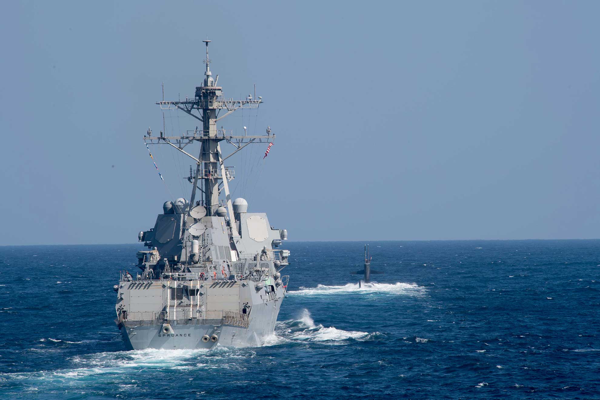 Arabian Sea (Dec. 18, 2018) The guided-missile destroyer USS Spruance (DDG 111) and the fast attack submarine USS Louisville (SSN 724) are underway in formation during the anti-submarine warfare exercise SHAREM 195 in the Arabian Sea, Dec. 18, 2018. Spruance is deployed to the U.S. 5th Fleet area of operations in support of naval operations to ensure maritime stability and security in the Central Region, connecting the Mediterranean and the Pacific through the western Indian Ocean and three strategic choke points -- U.S. Navy photo by MCS2 Abigayle Lutz. -