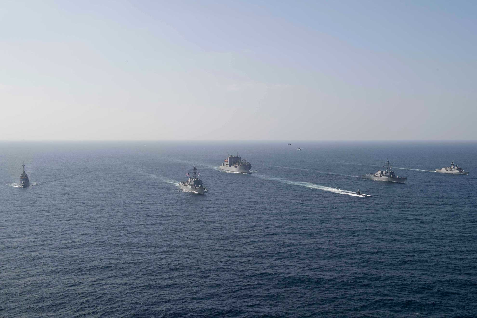 Arabian Sea (Dec. 18, 2018) The French navy air defense destroyer FS Cassard (D 614), left, the U.S. Navy guided-missile destroyer USS Stockdale (DDG 106), the fast attack submarine USS Louisville (SSN 724), the dry cargo and ammunition ship USNS Richard E. Byrd (T-AKE 4), the guided-missile destroyer USS Spruance (DDG 111), and the Royal Australian Navy frigate HMAS Ballarat (FFH 155) are underway in formation during the anti-submarine warfare exercise SHAREM 195 in the Arabian Sea, Dec. 18, 2018. Stockdale and Spruance are deployed to the U.S. 5th Fleet area of operations in support of naval operations to ensure maritime stability and security in the Central Region, connecting the Mediterranean and the Pacific through the western Indian Ocean and three strategic choke points -- U.S. Navy photo by MCS1 Ryan D. McLearnon. -