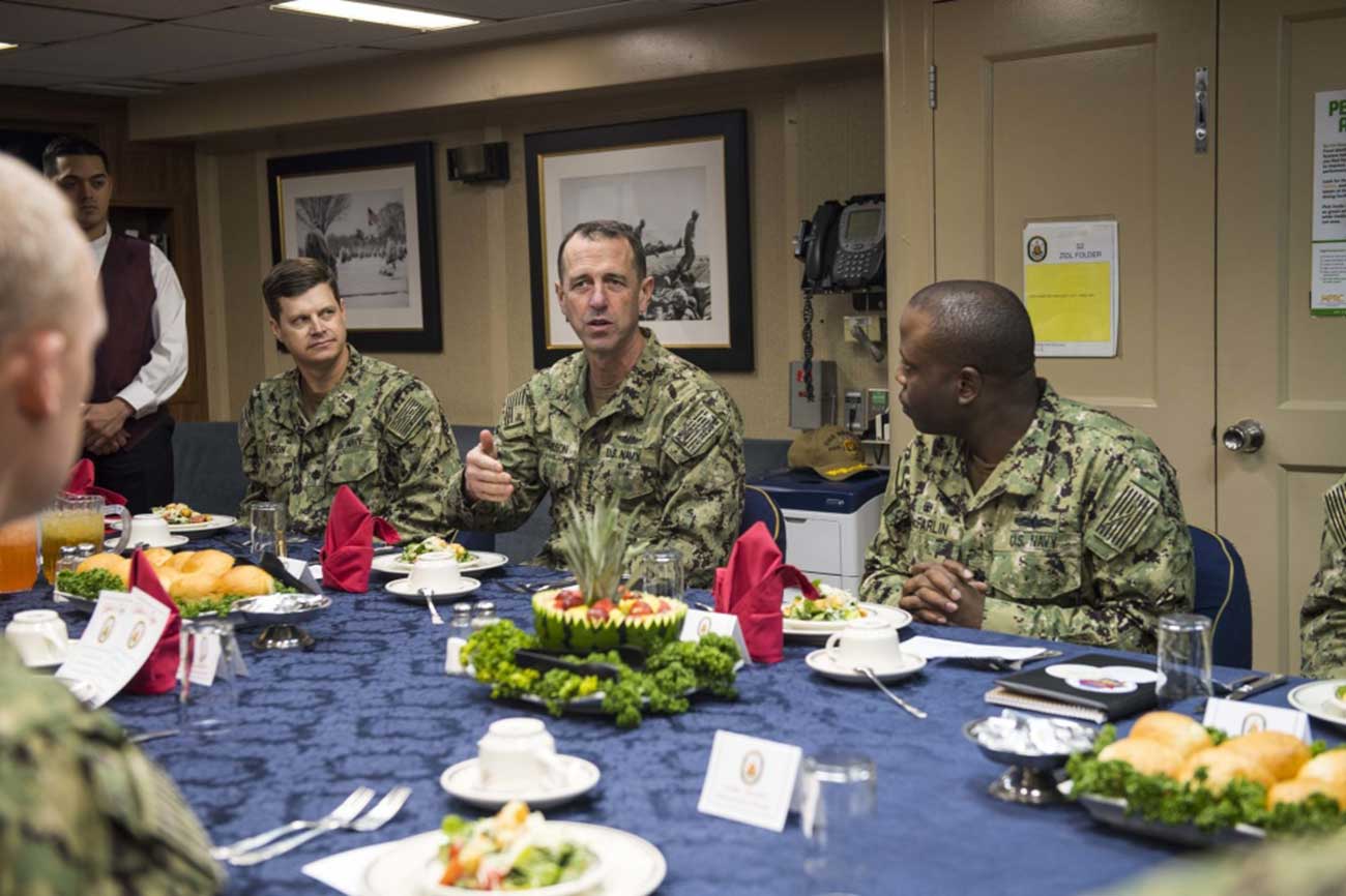 Yokosuka, Japan (Jan. 17, 2019) Chief of Naval Operations (CNO) Adm. John Richardson sits down for lunch with commanding officers from forward deployed ships inside the wardroom of the Arleigh Burke-class guided-missile destroyer USS Benfold (DDG 65). Benfold is forward-deployed to the U.S. 7th Fleet area of operations in support of security and stability in the Indo-Pacific region -- U.S. Navy photo by MCS2 Joshua Mortensen. -