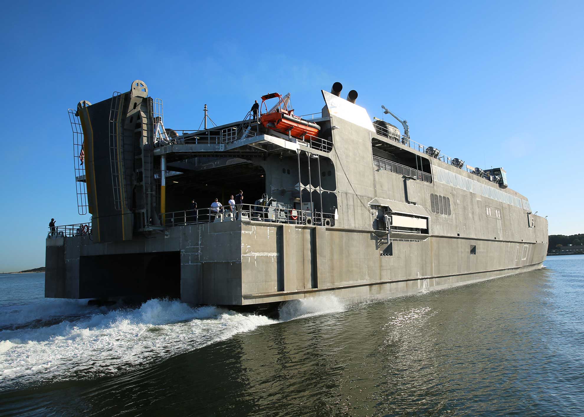 Virginia Beach, Va. (Oct. 5, 2017) The Military Sealift Command high-speed transport USNS Guam (HST 1) gets underway from Joint Expeditionary Base Little Creek-Fort Story, Oct. 5, 2017. Guam is underway to conduct testing and evaluation -- U.S. Navy photo by Bill Mesta. -