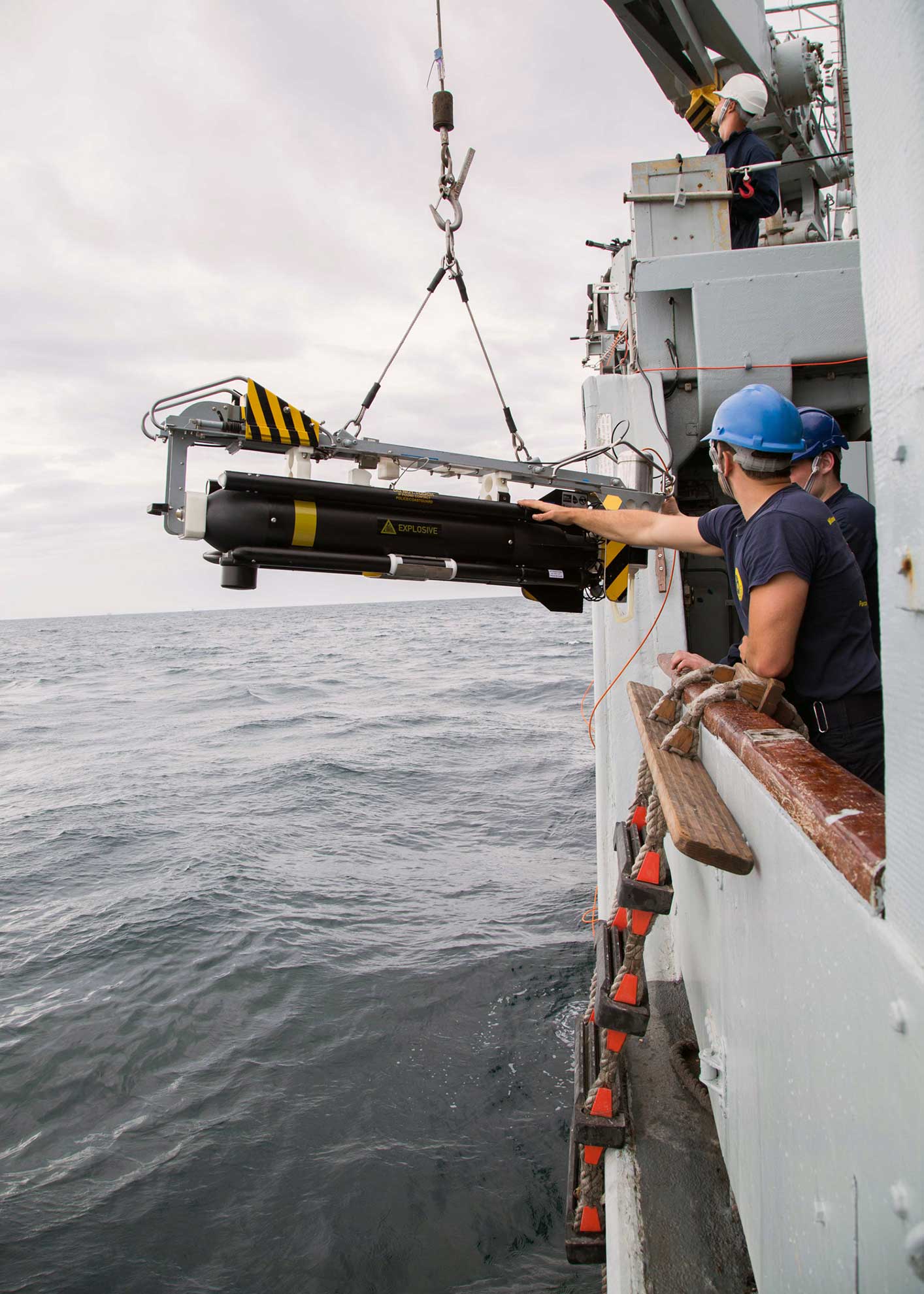 Arabian Gulf (April 13, 2019) Royal Navy sailors hoist a Sea Fox C-Round Mine Disposal System above the water, preparing to drop it in the sea for a training mission aboard the Royal Navy minehunter HMS Ledbury (M30) during Artemis Trident 19. Artemis Trident is a mine countermeasures exercise conducted by France's Marine Nationale, the United Kingdom's Royal Navy and the U.S. Navy in the Arabian Gulf focused on increasing interoperability and demonstrating the nations' shared commitment to ensuring unfettered maritime operations -- U.S. Army photo by Sgt. Sidney Weston. -