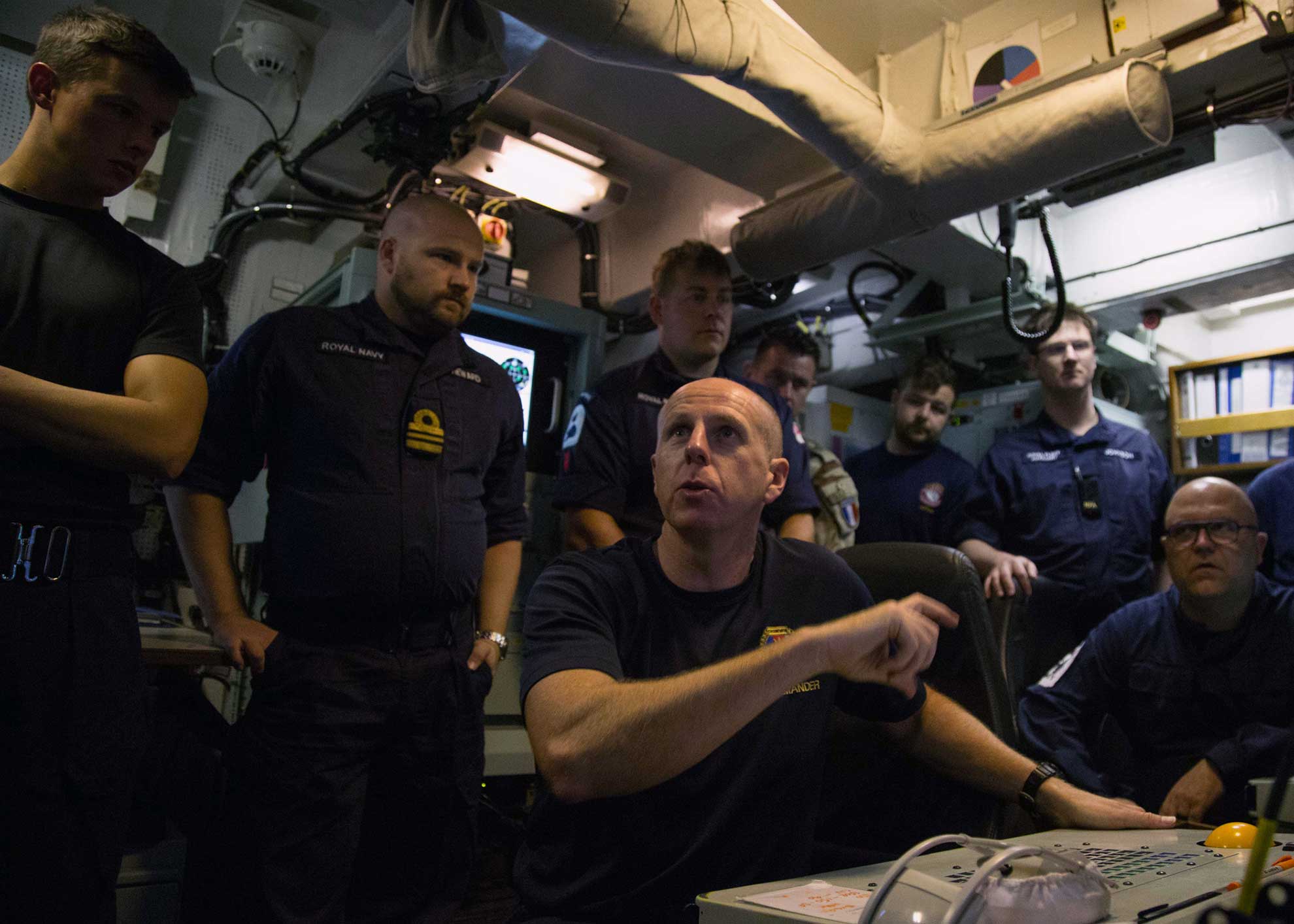 Arabian Gulf (April 13, 2019) Cmdr. Steve White, commander of Royal Navy mine countermeasure forces deployed to the Arabian Gulf, speaks to the crew of the Royal Navy minehunter HMS Ledbury (M30) during a command update aboard the Ledbury during Artemis Trident 19. Artemis Trident is a mine counter-measures exercise conducted by France's Marine Nationale, the United Kingdom's Royal Navy and the U.S. Navy in the Arabian Gulf focused on increasing interoperability and demonstrating the nations' shared commitment to ensuring unfettered maritime operations -- U.S. Army photo by Sgt. Sidney Weston. -