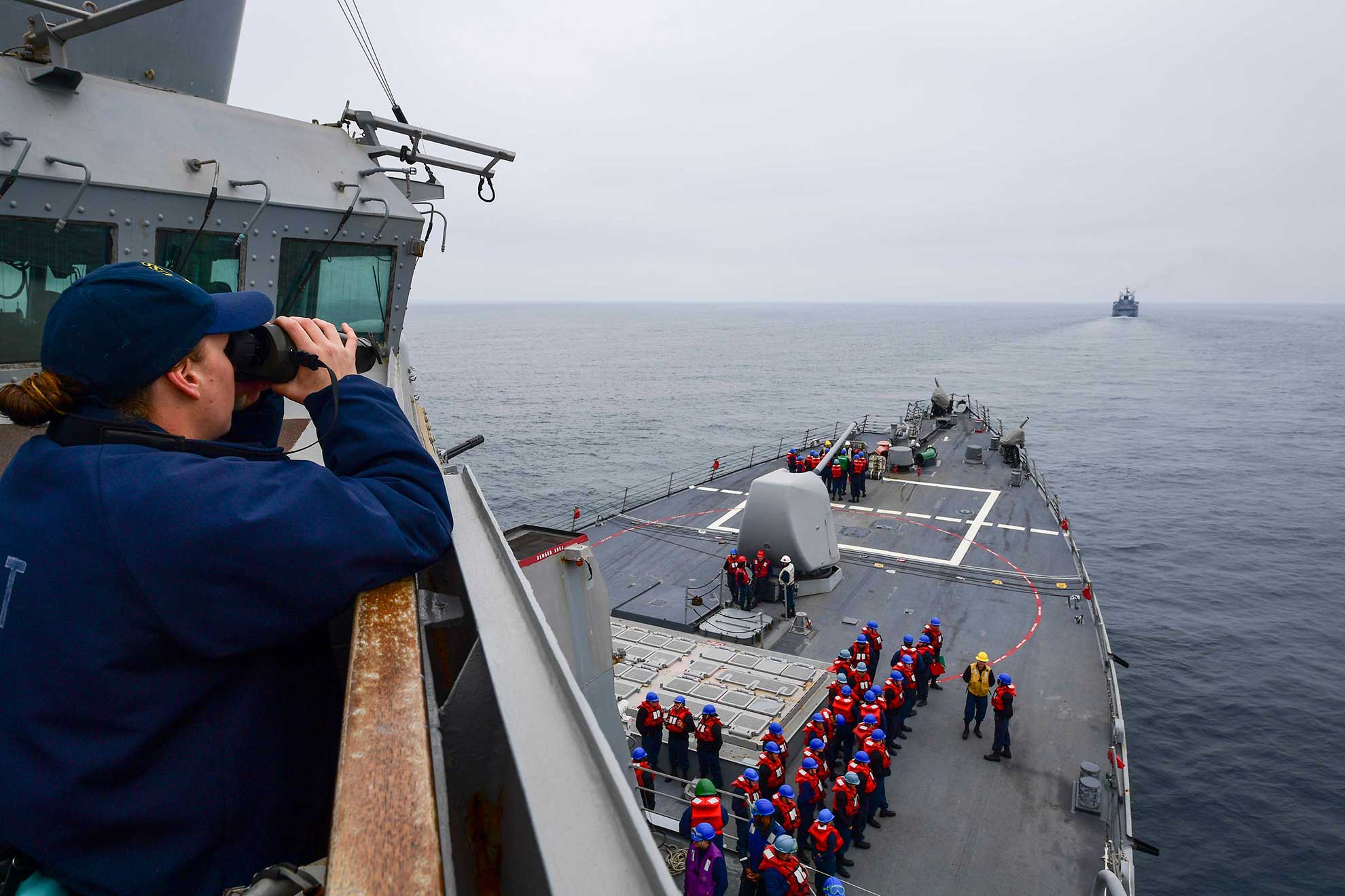 Black Sea (April 27, 2019) Ensign Margaret Pana measures the distance from the Arleigh Burke-class guided-missile destroyer USS Ross (DDG 71) to the Turkish Navy Akar-class replenishment oiler TCG Yarbay Kudret Gungor (A 595) for a replenishment-at-sea in the Black Sea, April 27, 2019. Ross, forward-deployed to Rota, Spain, is on its eighth patrol in the U.S. 6th Fleet area of operations in support of U.S. national security interests in Europe and Africa -- U.S. Navy photo by MCS 2nd Class Krystina Coffey. -