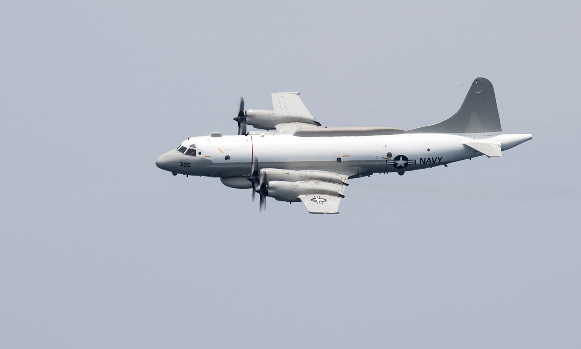 Official U.S. Navy file photo of an EP-3E Aries aircraft in flight. -