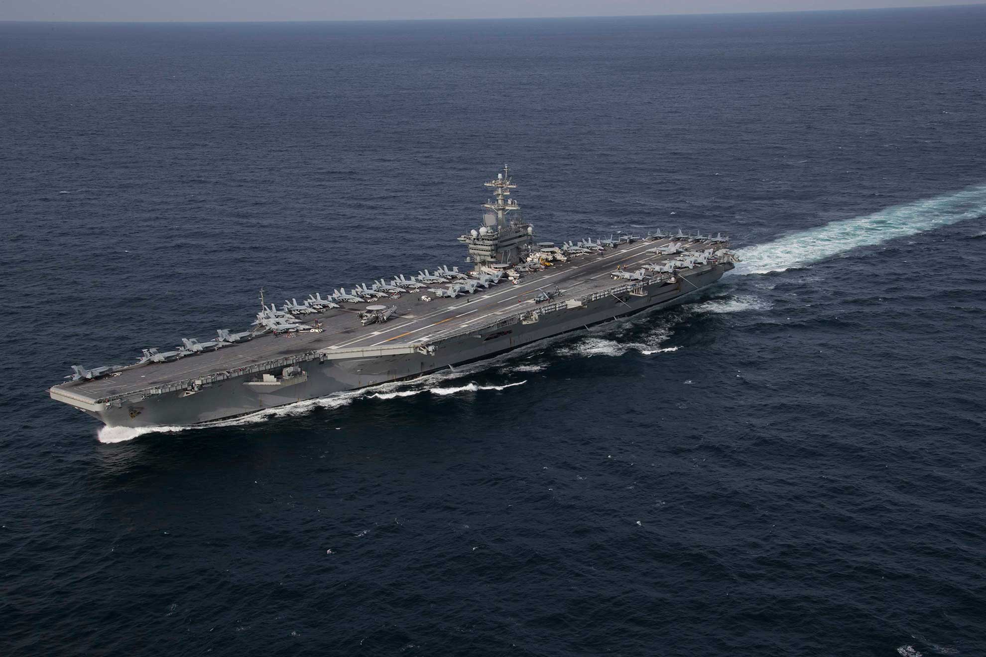 Atlantic Ocean (Jan. 30, 2019) The Nimitz-class aircraft carrier USS Abraham Lincoln (CVN 72) transits the Atlantic Ocean during a strait transit exercise. Abraham Lincoln is underway conducting a composite training unit exercise with Carrier Strike Group (CSG) 12. The components of CSG 12 embody a "team-of-teams" concept, combining advanced surface, air and systems assets to create and sustain operational capability. This enables them to prepare for and conduct global operations, have effective and lasting command and control, and demonstrate dedication and commitment to becoming the strongest warfighting force for the Navy and the nation -- U.S. Navy photo by MCS3 Clint Davis. -