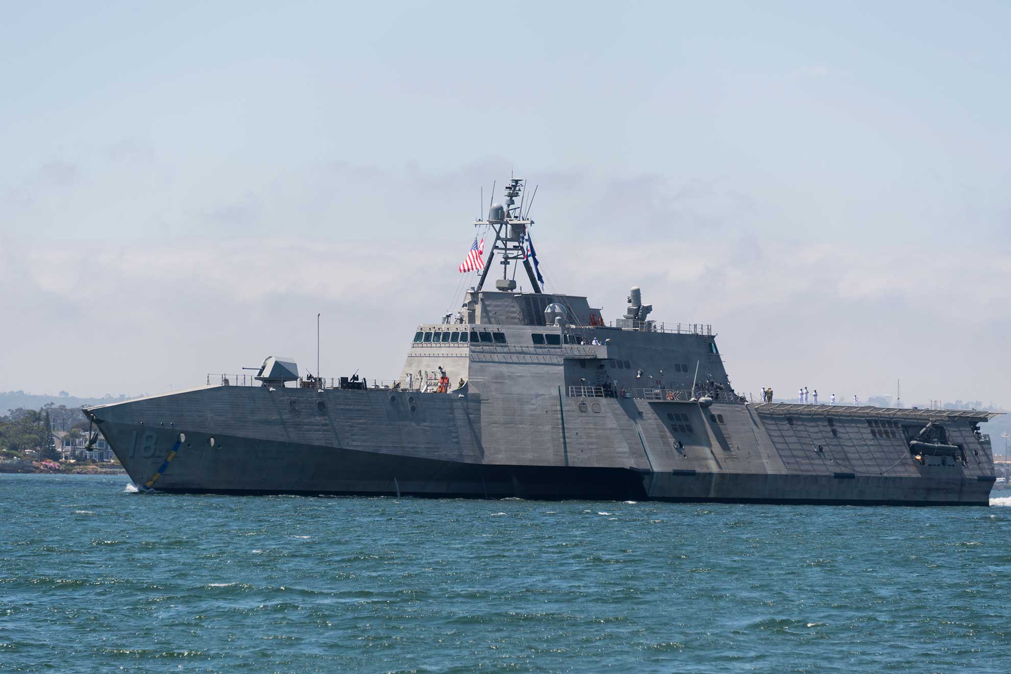 San Diego (April 19, 2019) The Independence-variant littoral combat ship USS Charleston (LCS 18) sails through San Diego Bay in transit to the ship's Naval Base San Diego homeport, successfully completing the ship's maiden voyage from the Austal USA shipyard in Mobile, Alabama. Charleston is the ninth ship in the littoral combat ship Independence-variant class and is the eleventh LCS to be homeported in San Diego -- U.S. Navy photo by MCS 1st Class Woody S. Paschall. -