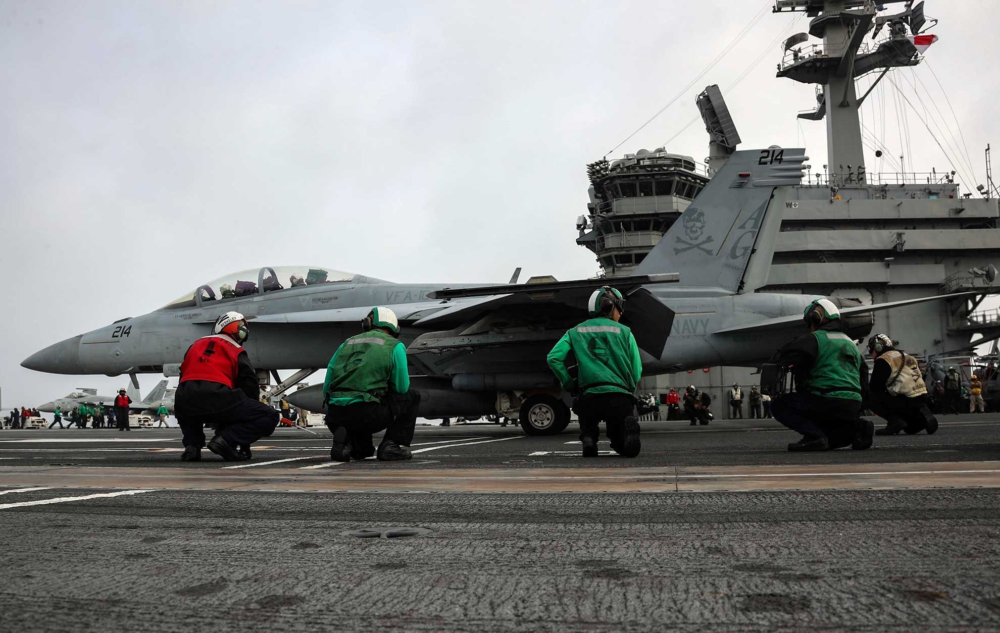 Mediterranean Sea (April 21, 2019) Sailors prepare an F/A-18F Super Hornet from the "Jolly Rogers" of Strike Fighter Squadron (VFA) 103 to launch from the flight deck of the Nimitz-class aircraft carrier USS Abraham Lincoln (CVN 72). Abraham Lincoln is deployed as part of the Abraham Lincoln Carrier Strike Group in support of maritime security cooperation efforts in the U.S. 5th, U.S. 6th and U.S. 7th Fleet areas of operation. With Abraham Lincoln as the flagship, deployed strike group assets include staffs, ships and aircraft of Carrier Strike Group (CSG) 12, Destroyer Squadron (DESRON) 2 and Carrier Air Wing (CVW) 7; as well as the Spanish navy Alvaro de Bazan-class frigate ESPS Mendez Nuñez (F 104) -- U.S. Navy photo by MCS 3rd Class Jeff Sherman. -