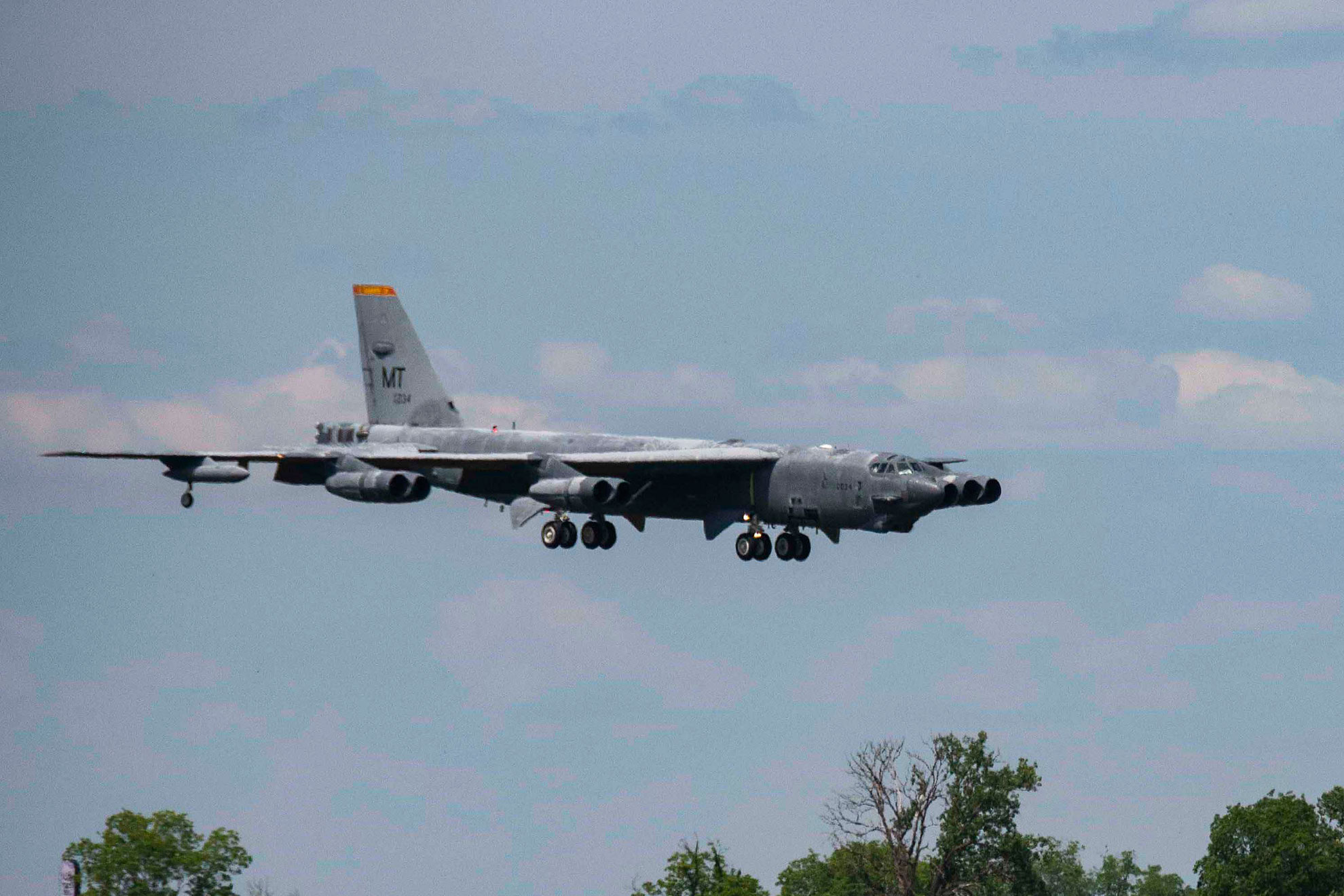 A B-52 Stratofortress, nicknamed "Wise Guy," makes its final approach to Barksdale AFB, La., May 14, 2019. The bomber was flown out of the 309th Aerospace Maintenance and Regeneration Group, also known as the "Boneyard," where it had been since 2008 -- U.S. Air Force photo by Master Sgt. Ted Daigle. -