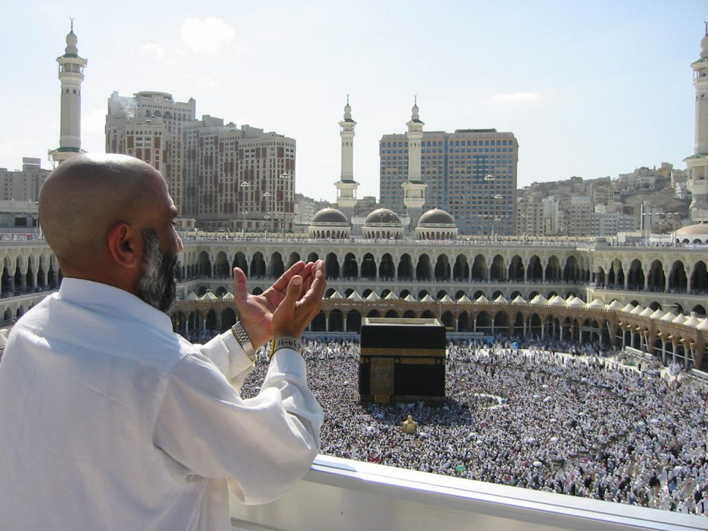 supplicating pilgrim at masjid al haram. mecca saudi arabia