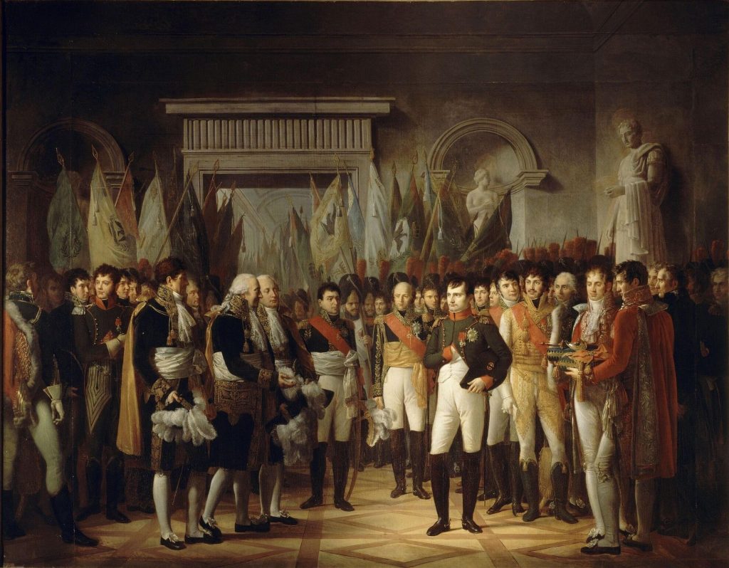 Le 19 novembre 1806, Napoléon Ier, accompagné des maréchaux d’Empire Murat, Berthier, Davout, Soult, Ney et Lefebvre, reçoit au palais royal de Berlin les députés du Sénat français après une grande parade des troupes françaises. Il les chargera de ramener à Paris ses trophées : les 340 drapeaux et étendards pris sur l’armée prussienne, pour être remis au gouverneur des Invalides avec l’épée, l’écharpe, la hausse-col et le cordon du grand Frédéric — Peinture de René Théodore Berthon
L’admiration de Napoléon